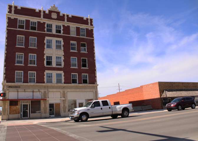 The Legacy Hotel will be revitalized into a 40 unit apartment complex. Laura Meyer Dick, owner of the hotel and Justin Pregont, the developer of the Meyer Landmark Project, presented the project timeline to the Rotary Club of Hutchinson on Monday, March 5. Photo by Emmie Boese.