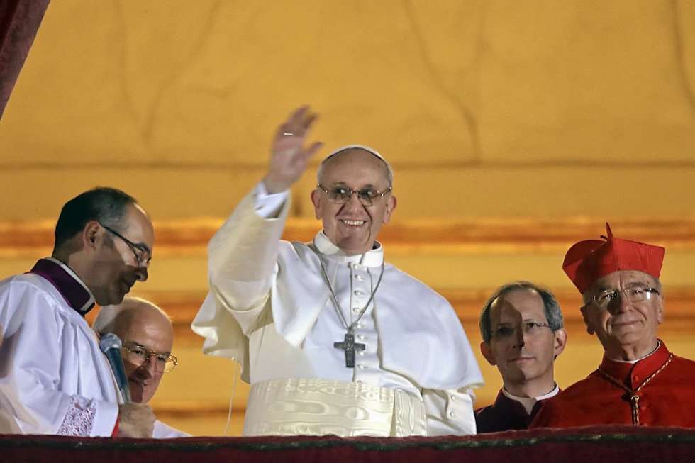 FILE - Pope Francis waves to the crowd from the central balcony of St. Peter’s Basilica at the Vatican, March 13, 2013. <b>(AP Photo/Gregorio Borgia, File)</b>