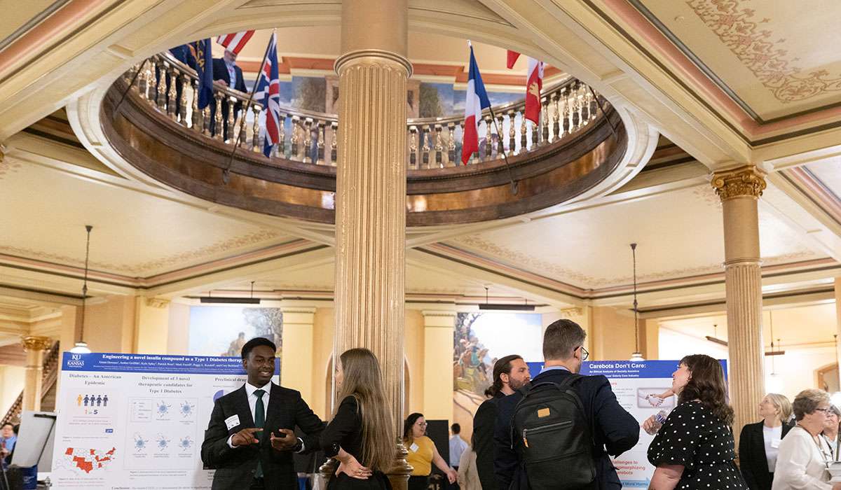 Jayhawks present at the 2023 Capitol Graduate Research Summit in 2023. Twelve KU graduate students will present to legislators and the public at the 2024 event March 21 in the state Capitol in Topeka. Credit: KU Marketing