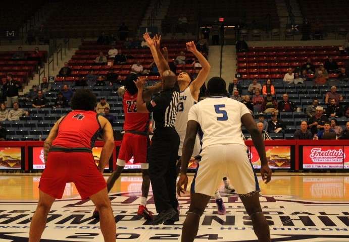 Walters State and Daytona State get ready for tip-off at the 2024 NJCAA Men's Basketball Championship. Walters State beat Daytona State 85-82 in the opening game of the tournament on Sunday, March 24, 2024. Photo by Emmie Boese.