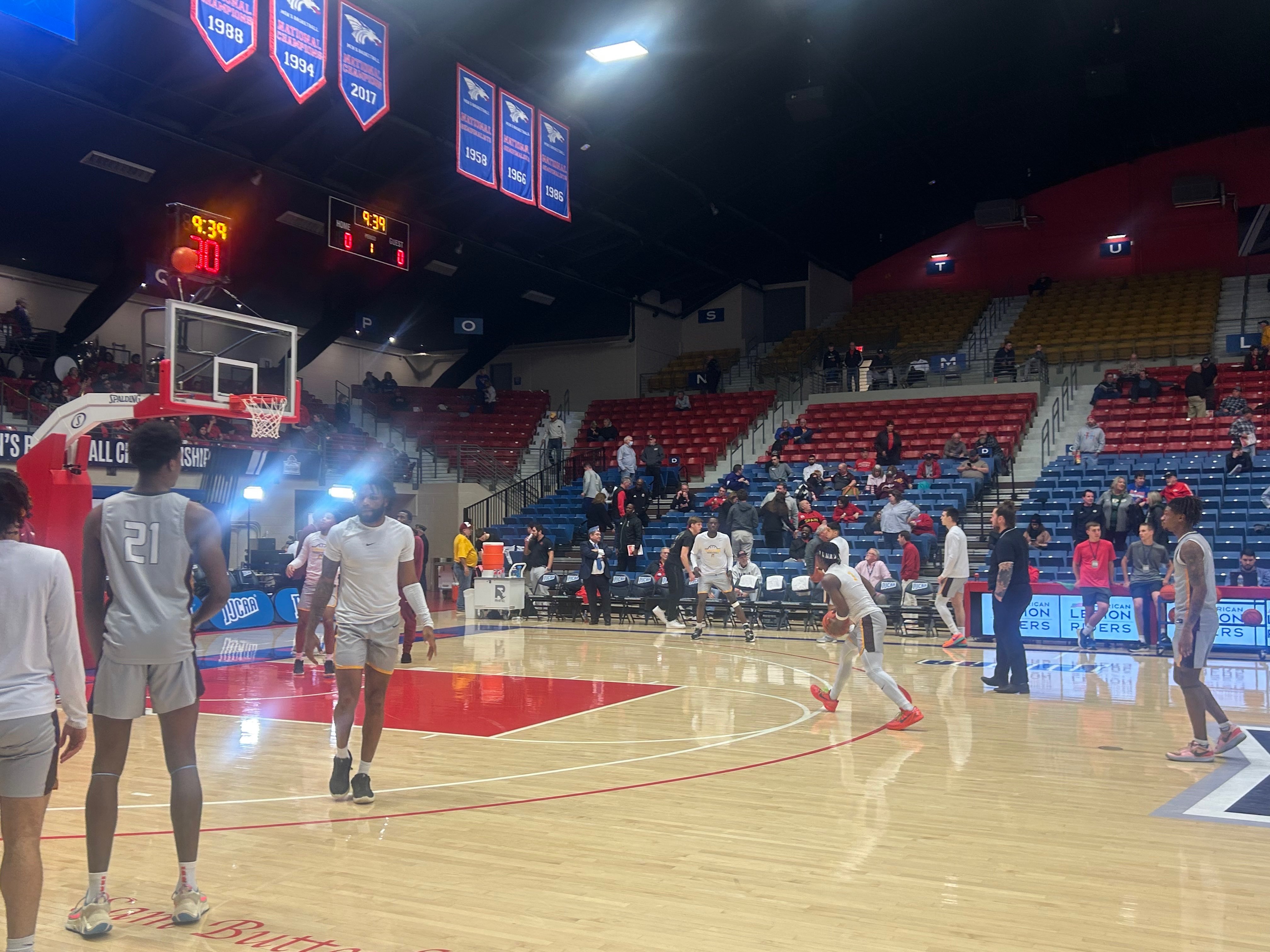 Triton shooting layups in warmups before their game against Trinity Valley. Triton will move on to the quarterfinals of the tournament after beating Trinity Valley 105-87 on Monday, March 25, 2024. Photo by Emmie Boese. 