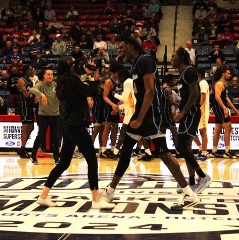 Sophomore forward Ray Jordan celebrates after Odessa College knocks No. 4 Vincennes at the 2024 NJCAA Division I Men's Basketball Championship. Jordan scored the game winning basket for Odessa in a 58-56 win on Tuesday, March 26, 2024. Photo by Emmie Boese.