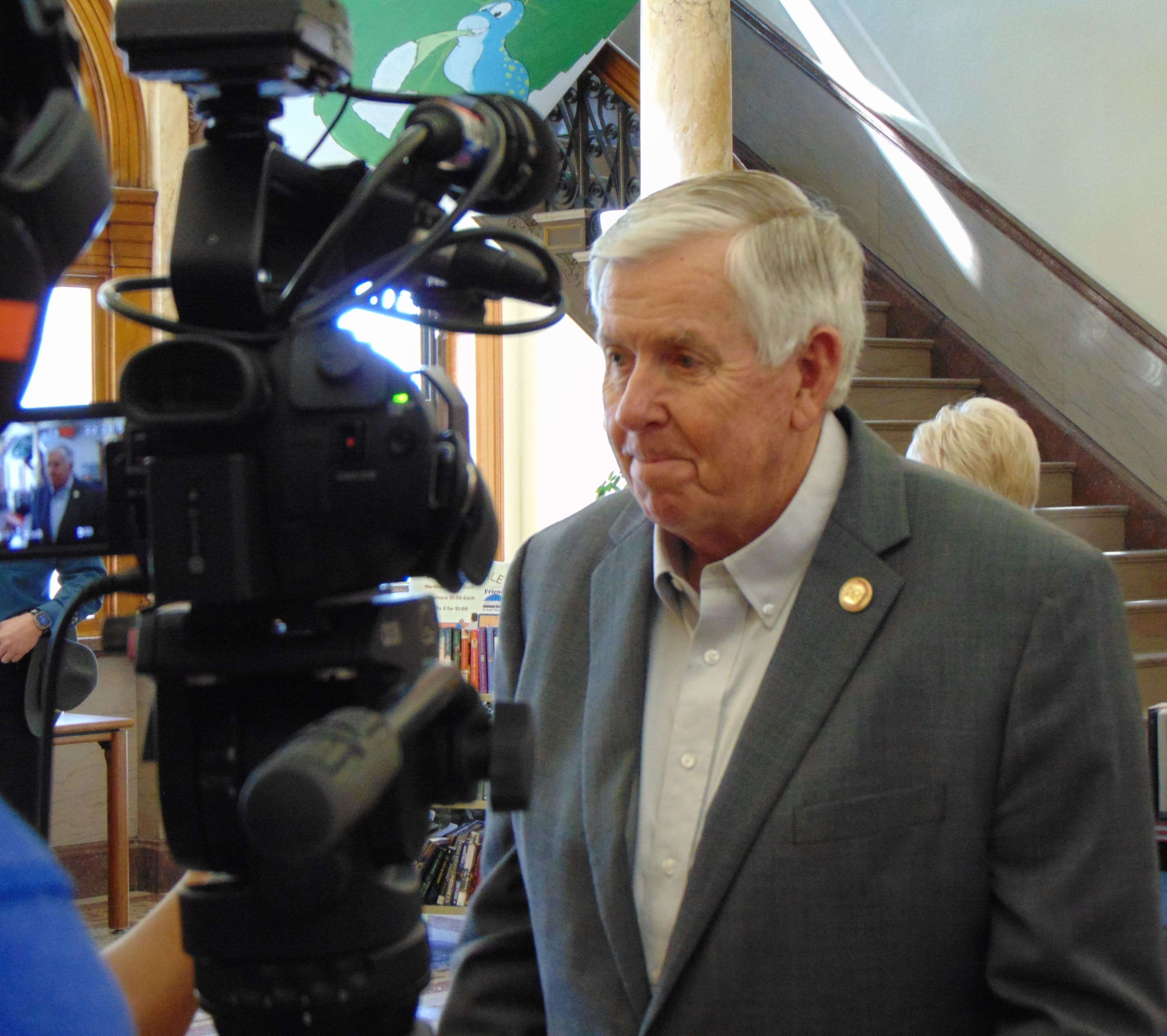 Gov Mike Parson speaks with reporters during his recent stop in St. Joseph/Photo by Brent Martin