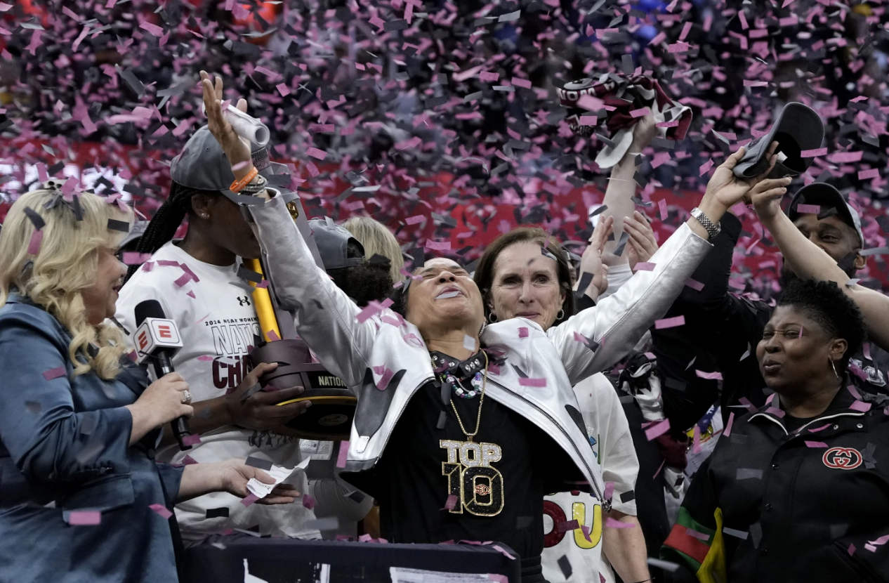 South Carolina head coach Dawn Staley celebrates after the Final Four college basketball championship game against Iowa in thee women's NCAA Tournament, Sunday, April 7, 2024, in Cleveland. South Carolina won 87-75. (AP Photo/Morry Gash)