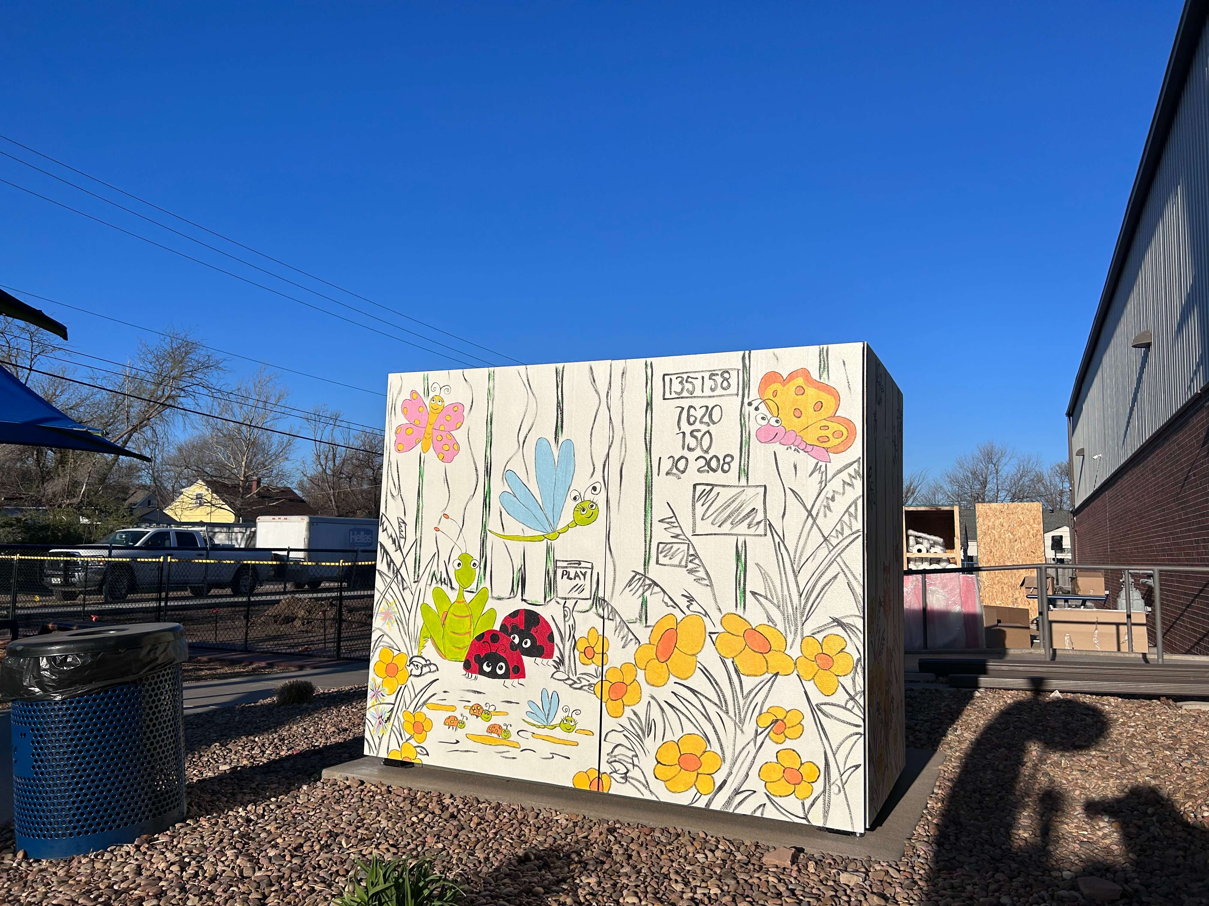 Mural surrounding an electrical box at the MyBackyard Playground in Great Bend.