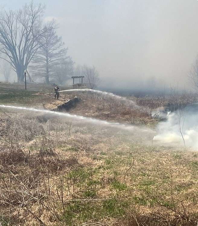 Firefighters tamp down Sugar Lake fire/Photo courtesy of Missouri State Highway Patrol