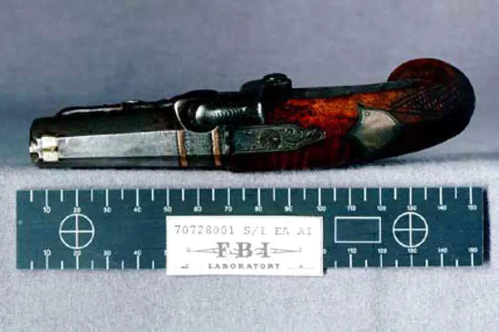 This is the Deringer pistol that was recovered from the state box at the Ford Theater and used by John Wilkes Booth to assassinate President Abraham Lincoln in 1865. (AP Photo/FBI)