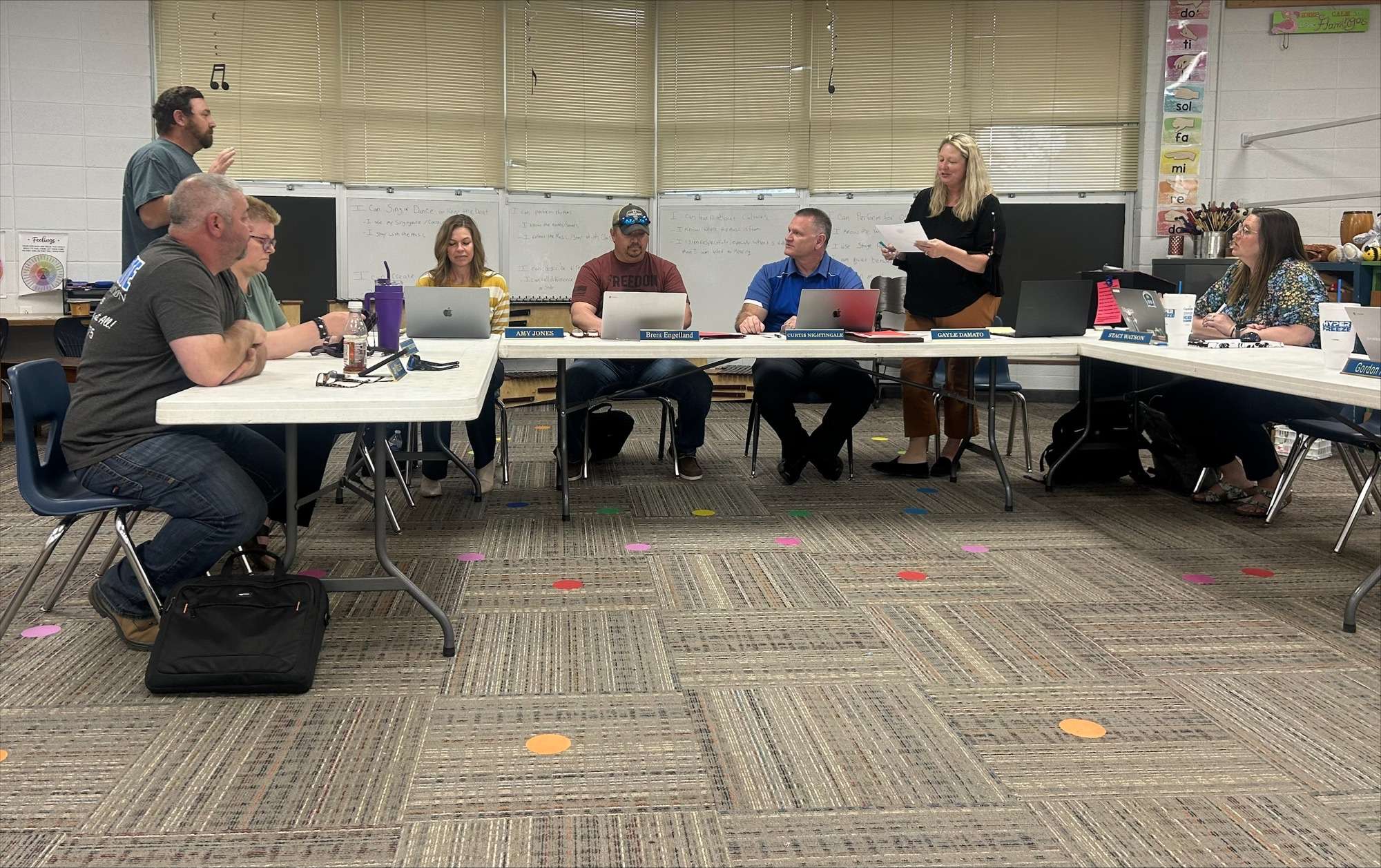 Jeremy Schmidt is sworn in by Gayle Damato as the newest board member of the USD 309 Nickerson Board of Education. Schmidt was sworn in at Nickerson's BOE meeting on Monday, April 15, 2024. Photo by Emmie Boese.&nbsp;