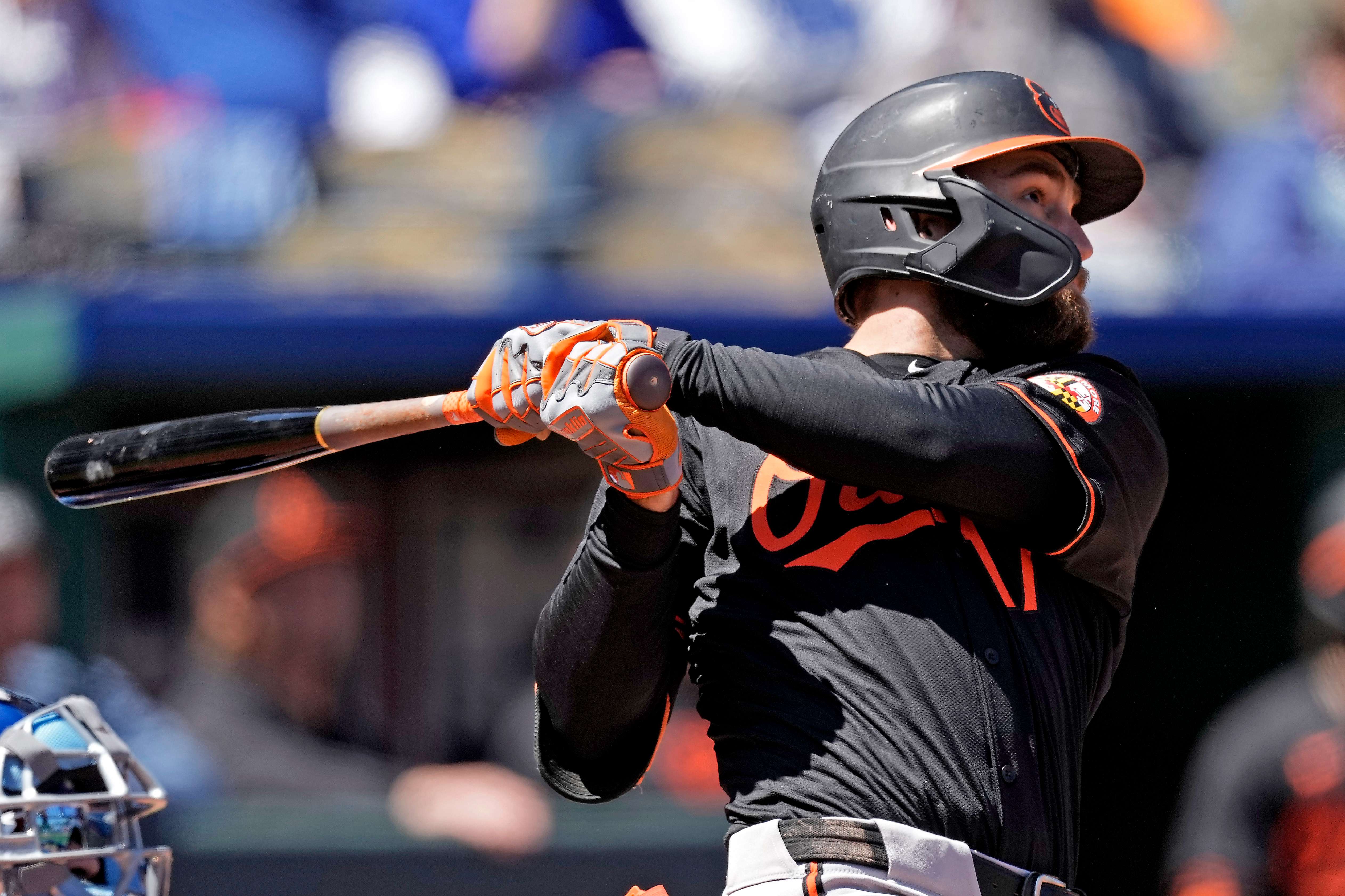 Baltimore Orioles' Colton Cowser watches his solo home run during the third inning of a baseball game against the Kansas City Royals Sunday, April 21, 2024, in Kansas City, Mo. (AP Photo/Charlie Riedel)