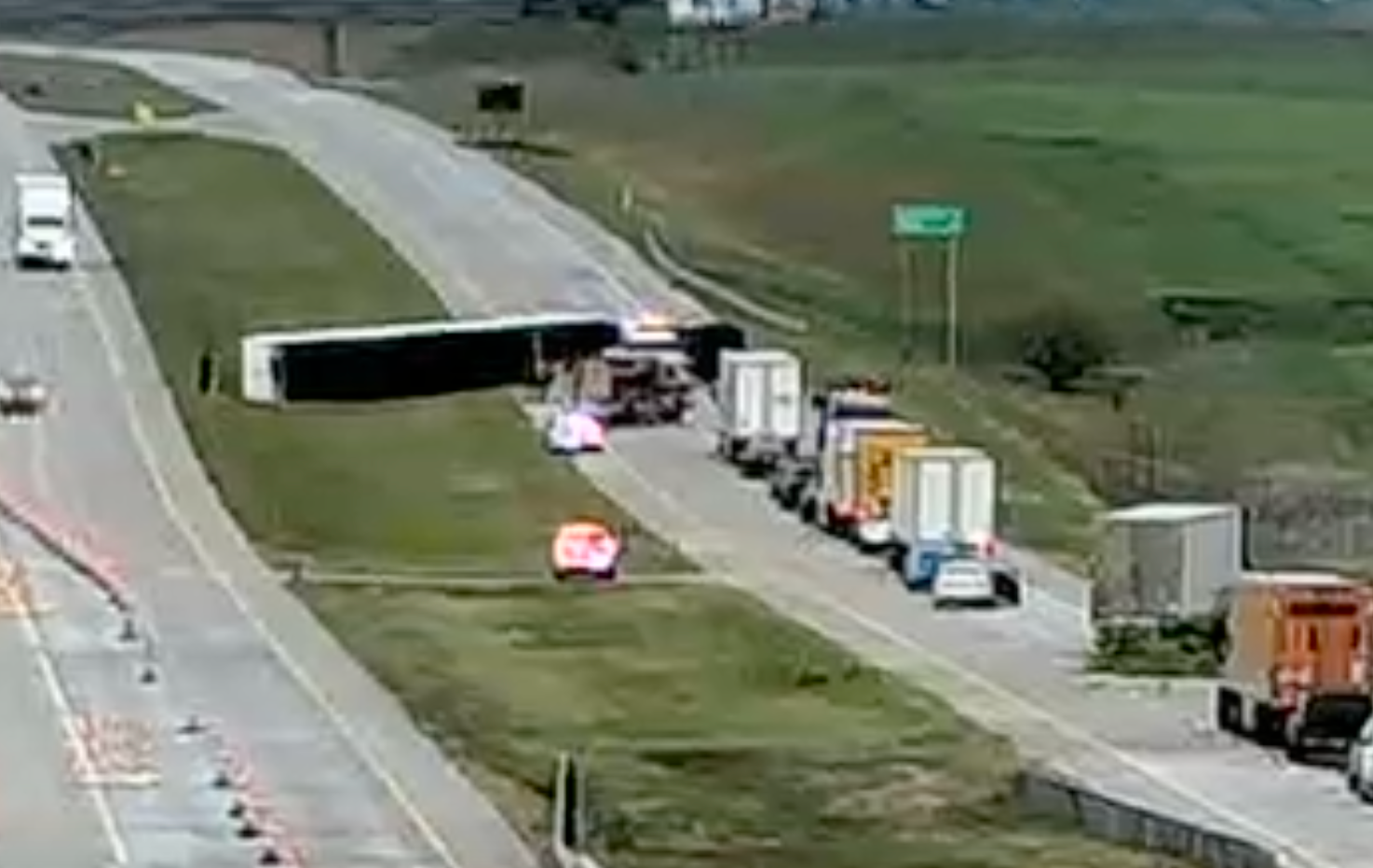 Driver hospitalized after wind blows semi over on Interstate 70