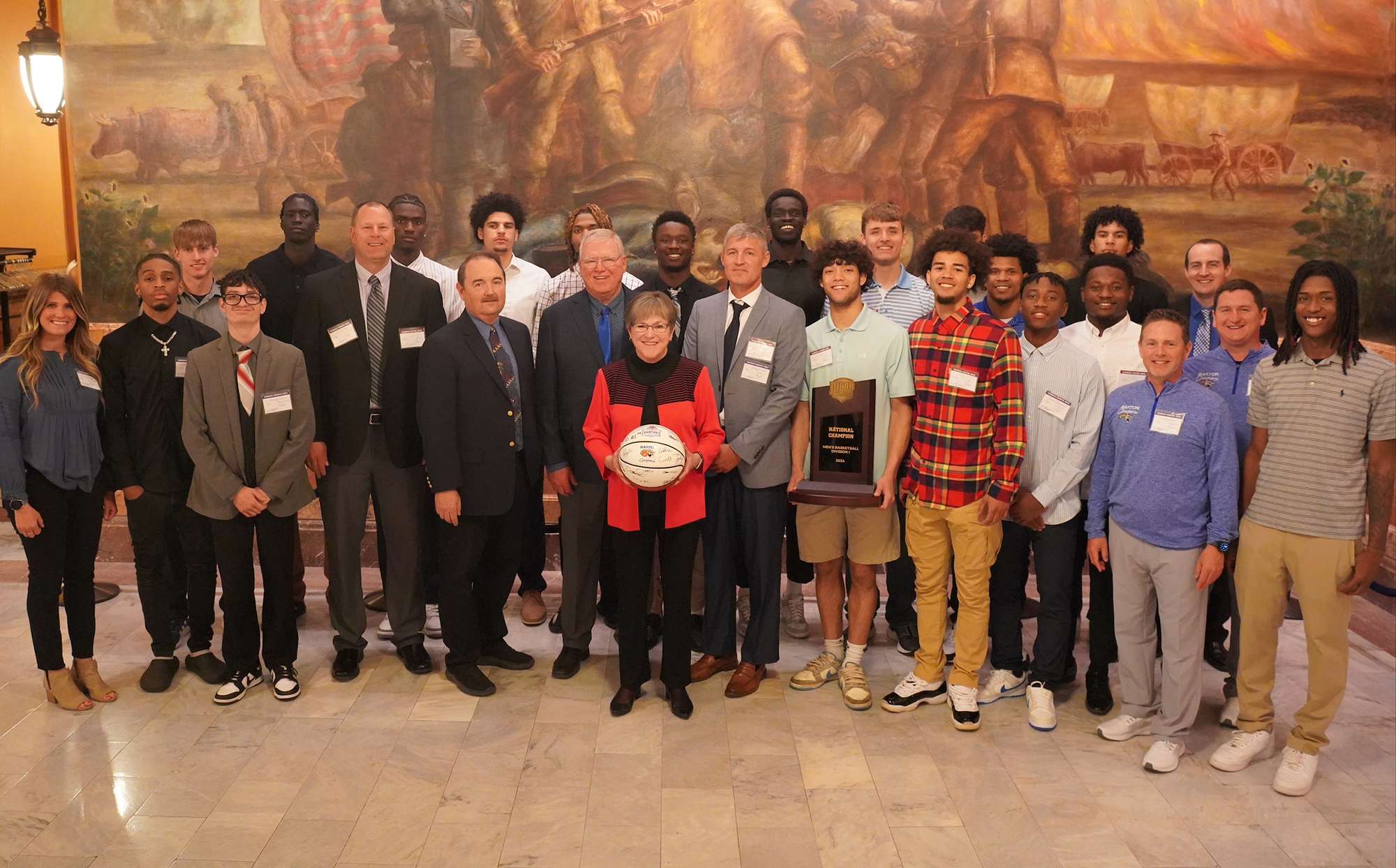 The Barton Community College men's basketball team posed for a picture with Kansas Governor Laura Kelly on Tuesday, April 30, 2024 at the State Capitol in Topeka. 
