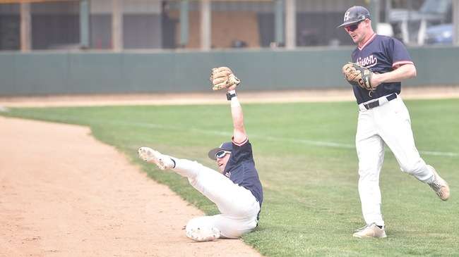 Blue Dragon shortstop Cooper Wesslund make a diving catch in foul territory on Thursday against the Allen Red Devils in a 3-0 Hutchinson victory at Hobart-Detter Field. (Sammi Carpenter/Blue Dragon Sports Information)