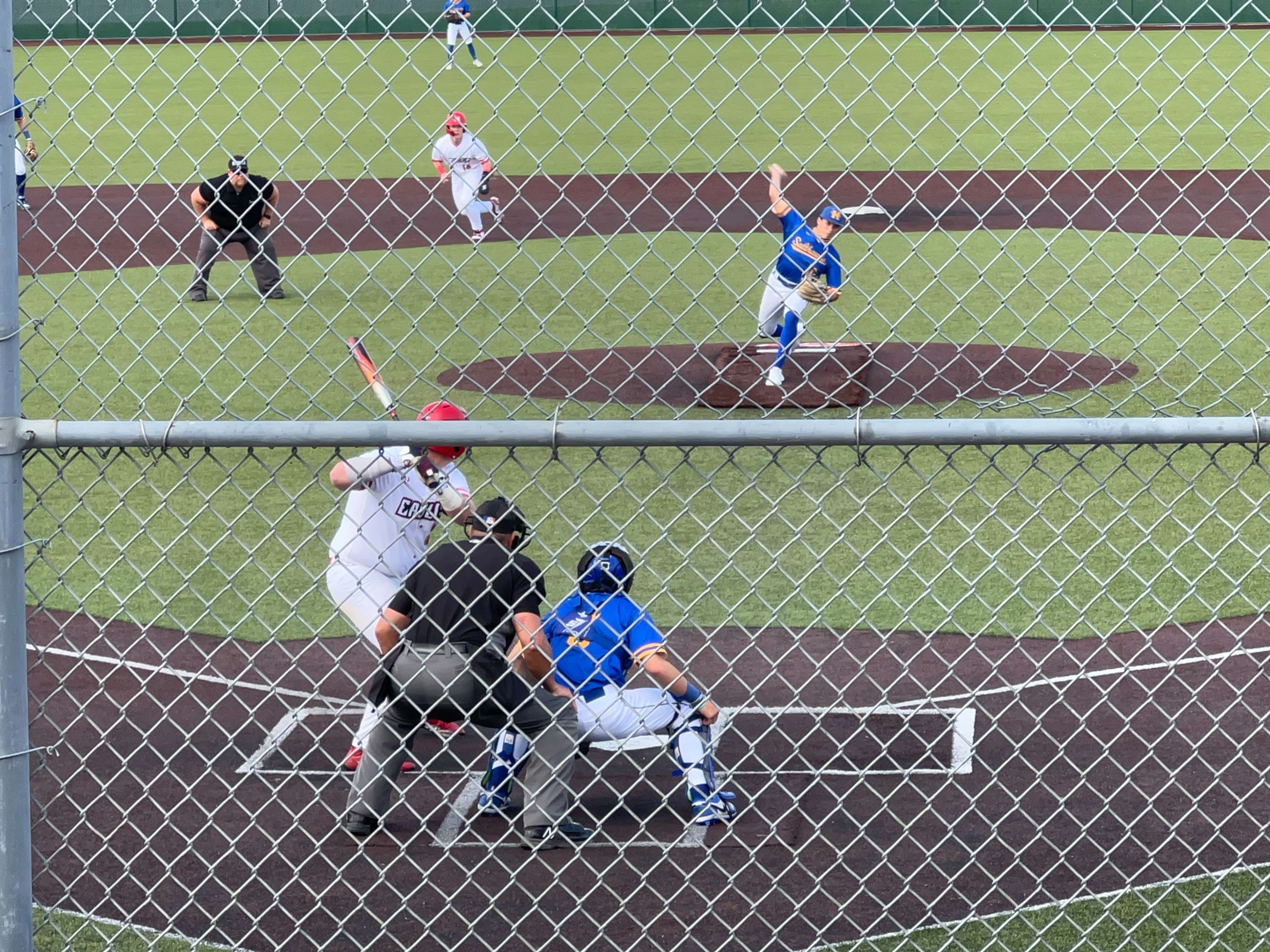 Hutchinson senior pitcher Lakin Franz delivers a pitch to Maize senior Cole Chalashtari in game one at Maize on Friday, May 3. (Hutch Post Photo/Sean Boston)