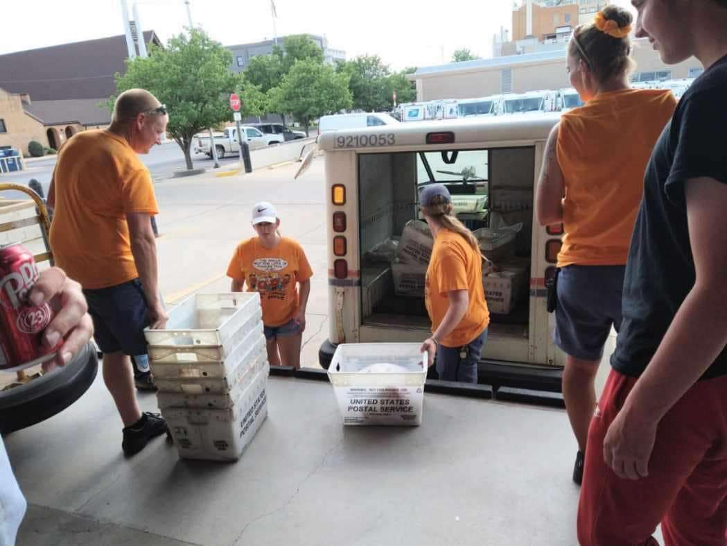 Postal Workers and their families helped with the Stamp Out Hunger food drive Saturday, May 11. Photo Courtesy Reno County Food Bank.
