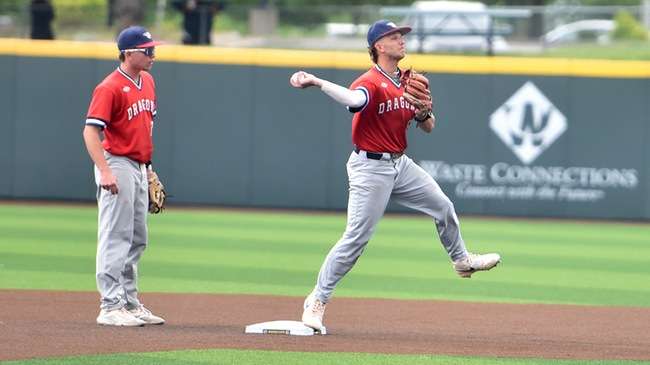 Second baseman Hank Griffin starts an inning-ending 6-4 double play to get out of the eighth inning in Blue Dragon Baseball's 5-4 Plains District Tournament elimination game victory over Dodge City on Thursday at Eck Stadium in Wichita. (Sammi Carpenter/Blue Dragon Sports Information)