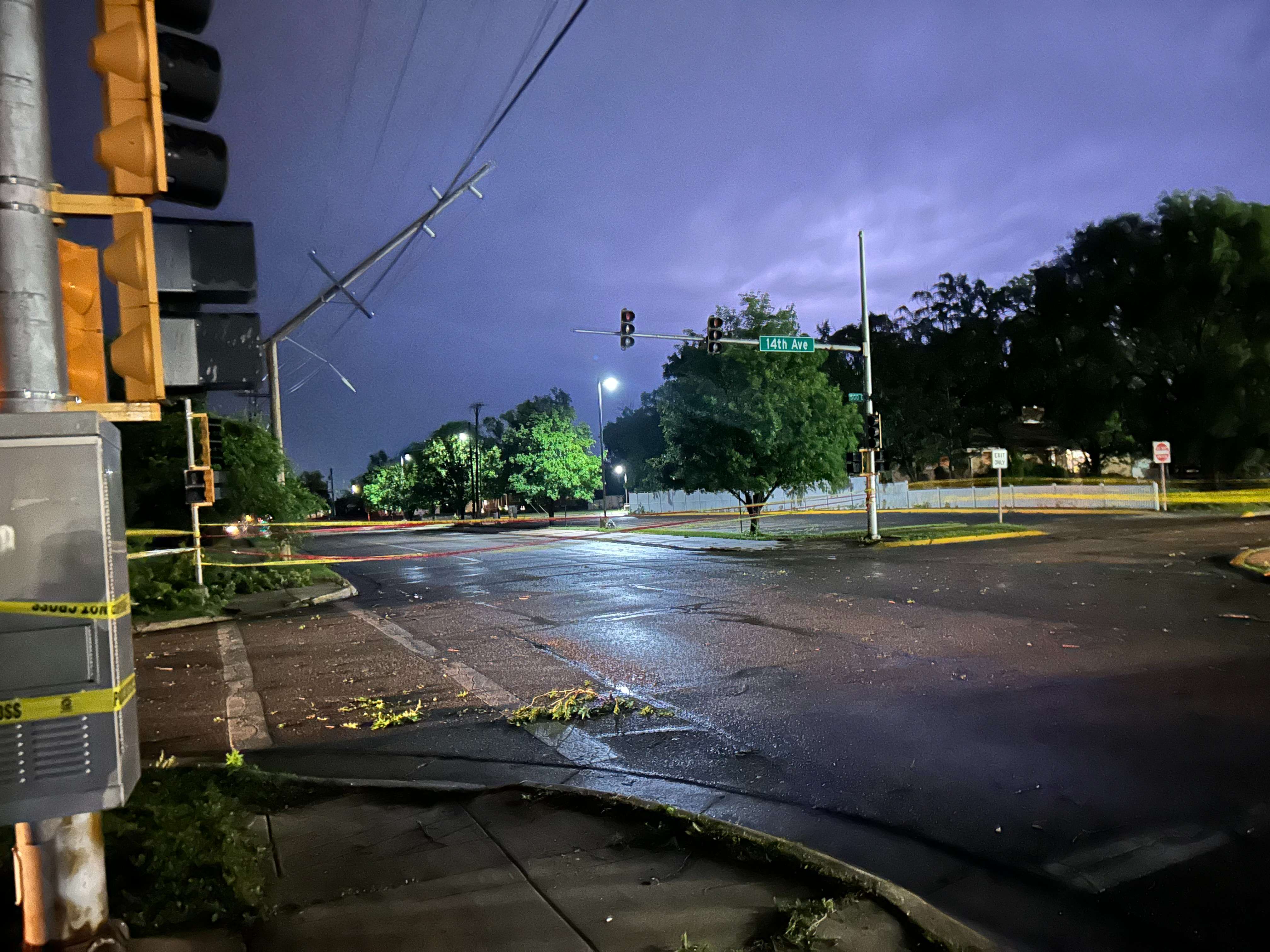 A power line is hanging down on 14th and Plum as a result of a severe thunderstorm in Hutchinson. The storm took place on Sunday, May 19, 2024. Photo by Emmie Boese.