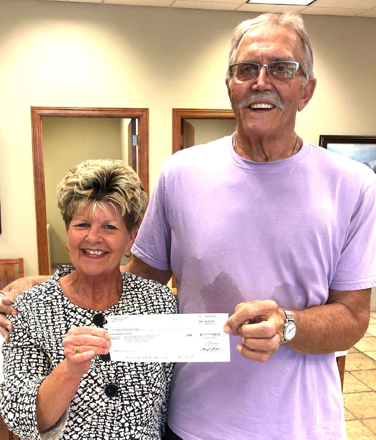 ( L-R ) Scott Olsen, President, Wendy King-Luttman, Treasurer