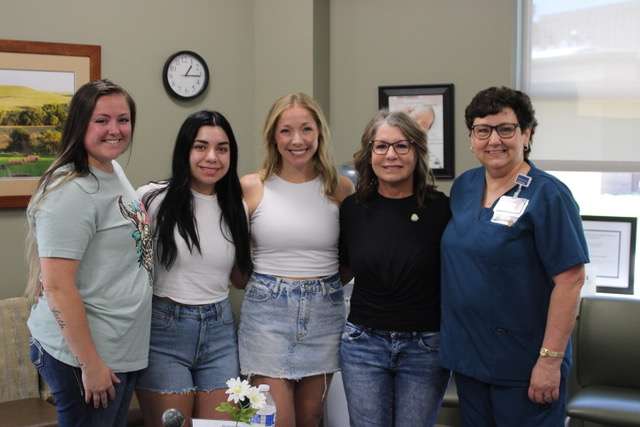 Jeannie Kolb, second from right, recently was honored with the DAISY Award for her nursing skills at Pawnee Valley Community Hospital. Others helping her celebrate the recognition, from left to right, are: Kolb’s daughters, Summer Snyder, Devri Viegra and Tabatha Snyder, along with Cindy Burton, PVCH director of nursing.