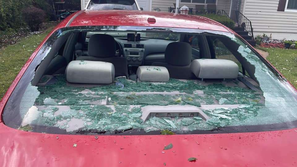 Hail damage to a vehicle on W. 6th Street in Larned. photo by Rawya Evers.