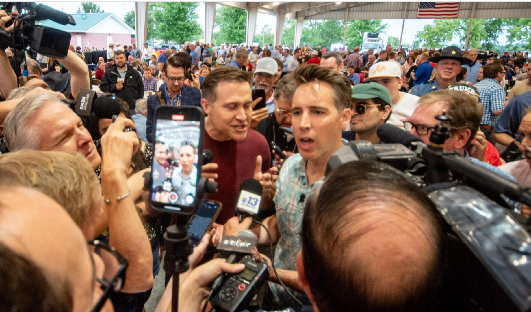 Democratic candidate for U.S. Senate Lucas Kunce and Republican incumbent Josh Hawley, converge Aug. 15 in the middle of the governor’s ham breakfast at the Missouri State Fair in Sedalia (Annelise Hanshaw/Missouri Independent).