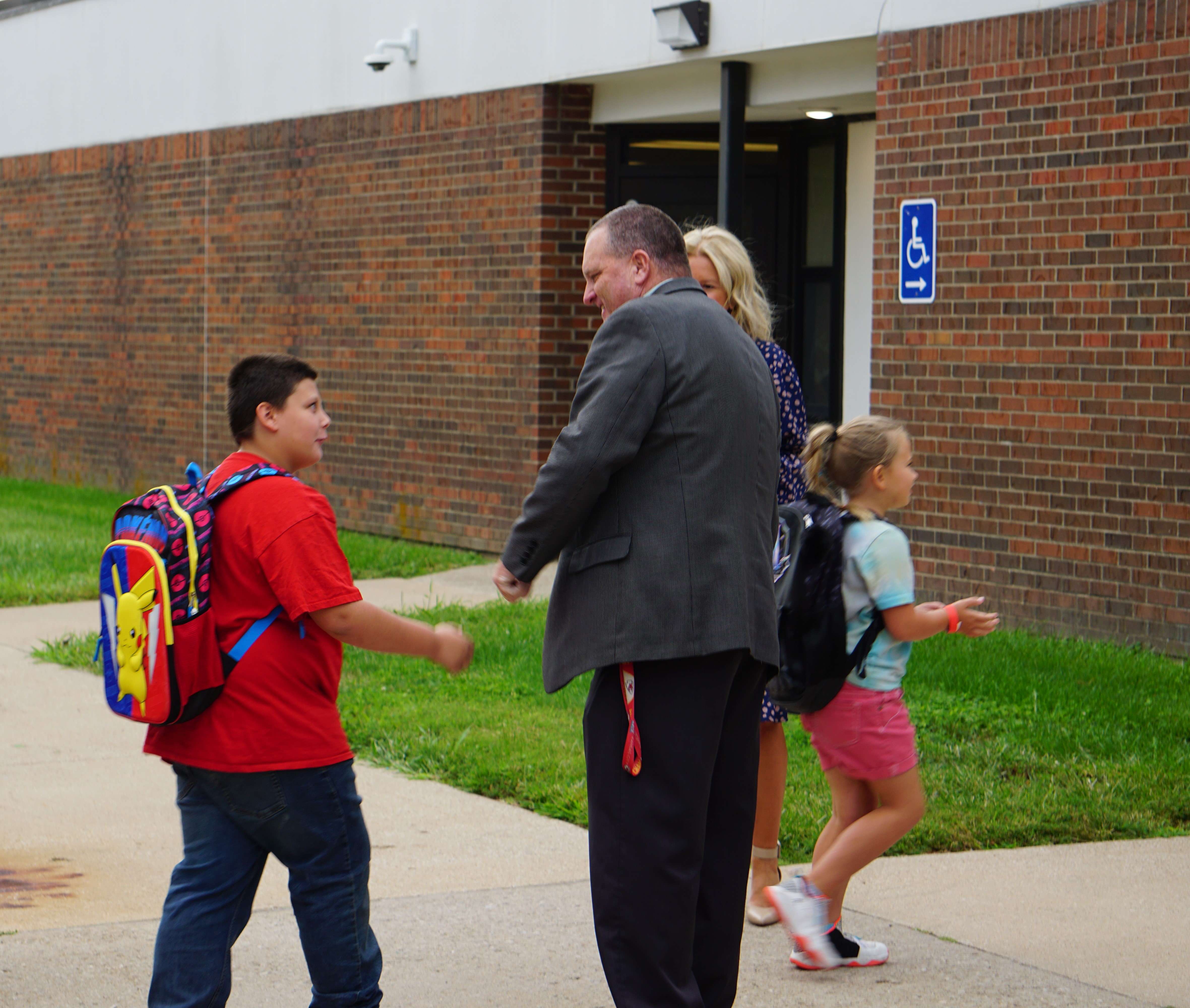 St. Joseph School Superintendent Gabe Edgar greets students at Parkway Elementary/ Photo by Matt Pike