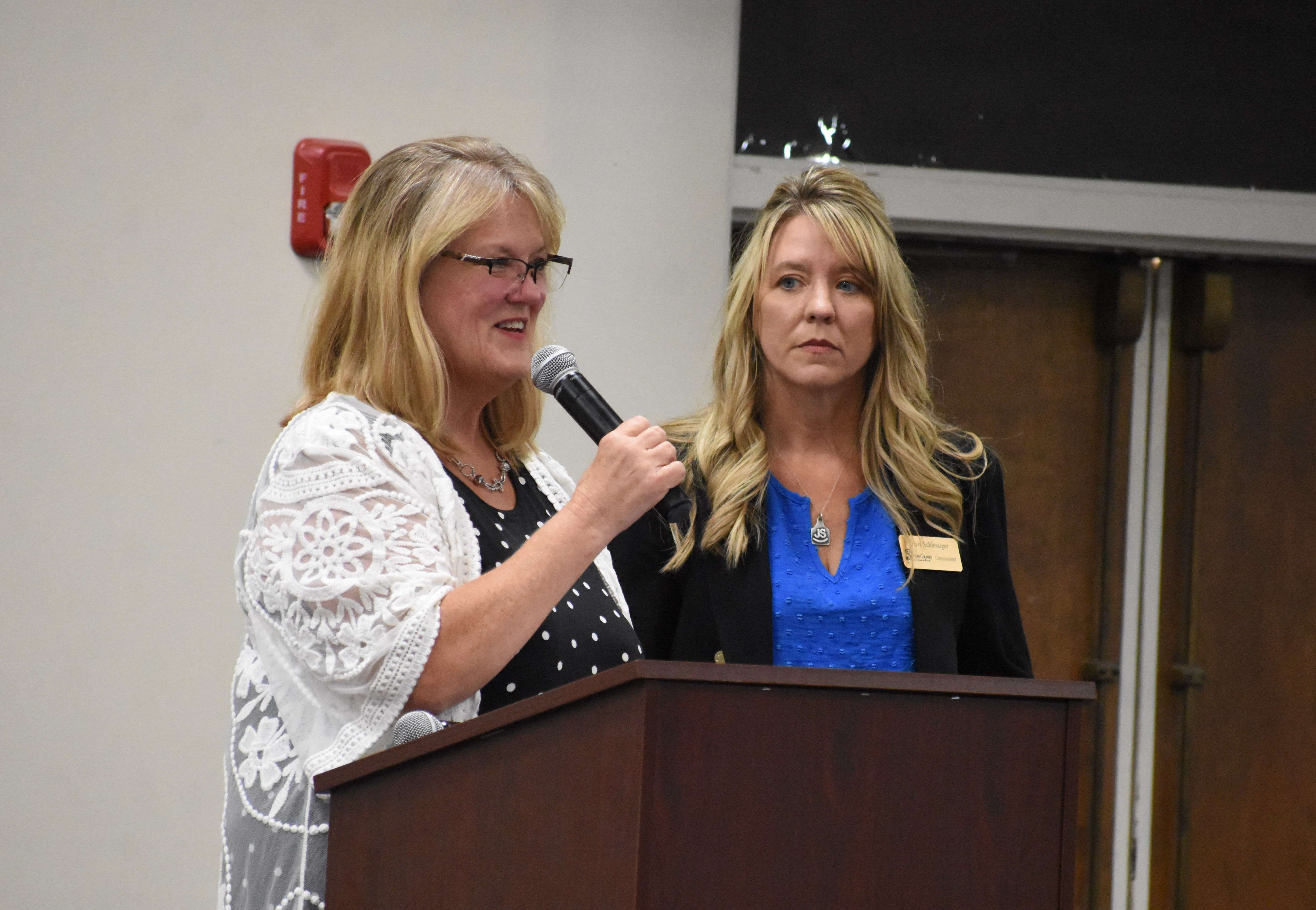 Barton County Commissioners Barb Esfeld (left) and Tricia Schlessiger at an informational meeting in Great Bend on Aug. 20.