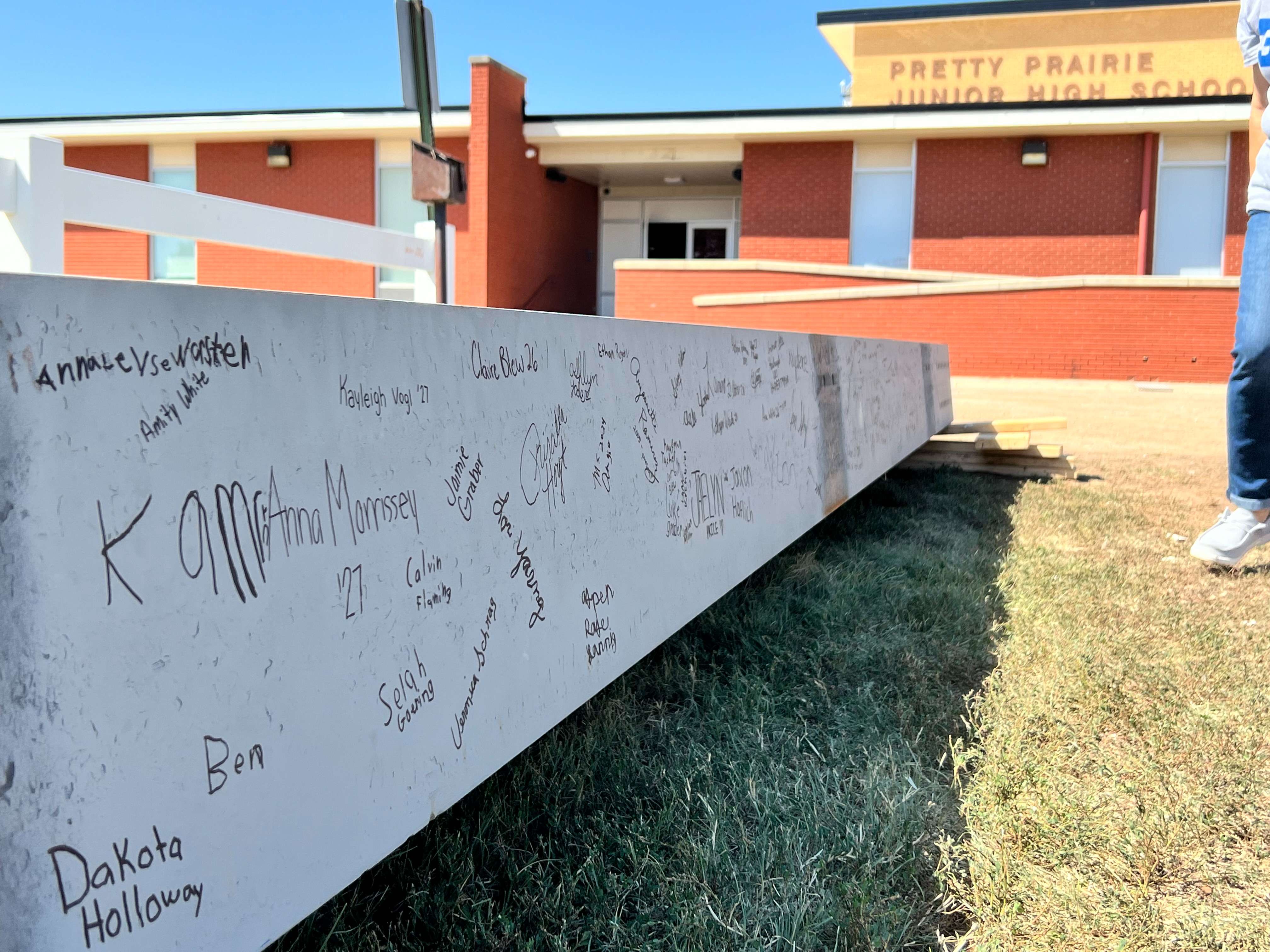 Pretty Prairie USD 311 held a beam signing on Tuesday, Sept. 10, 2024, for its middle school gym expansion. (Sean Boston/Hutch Post Photo)