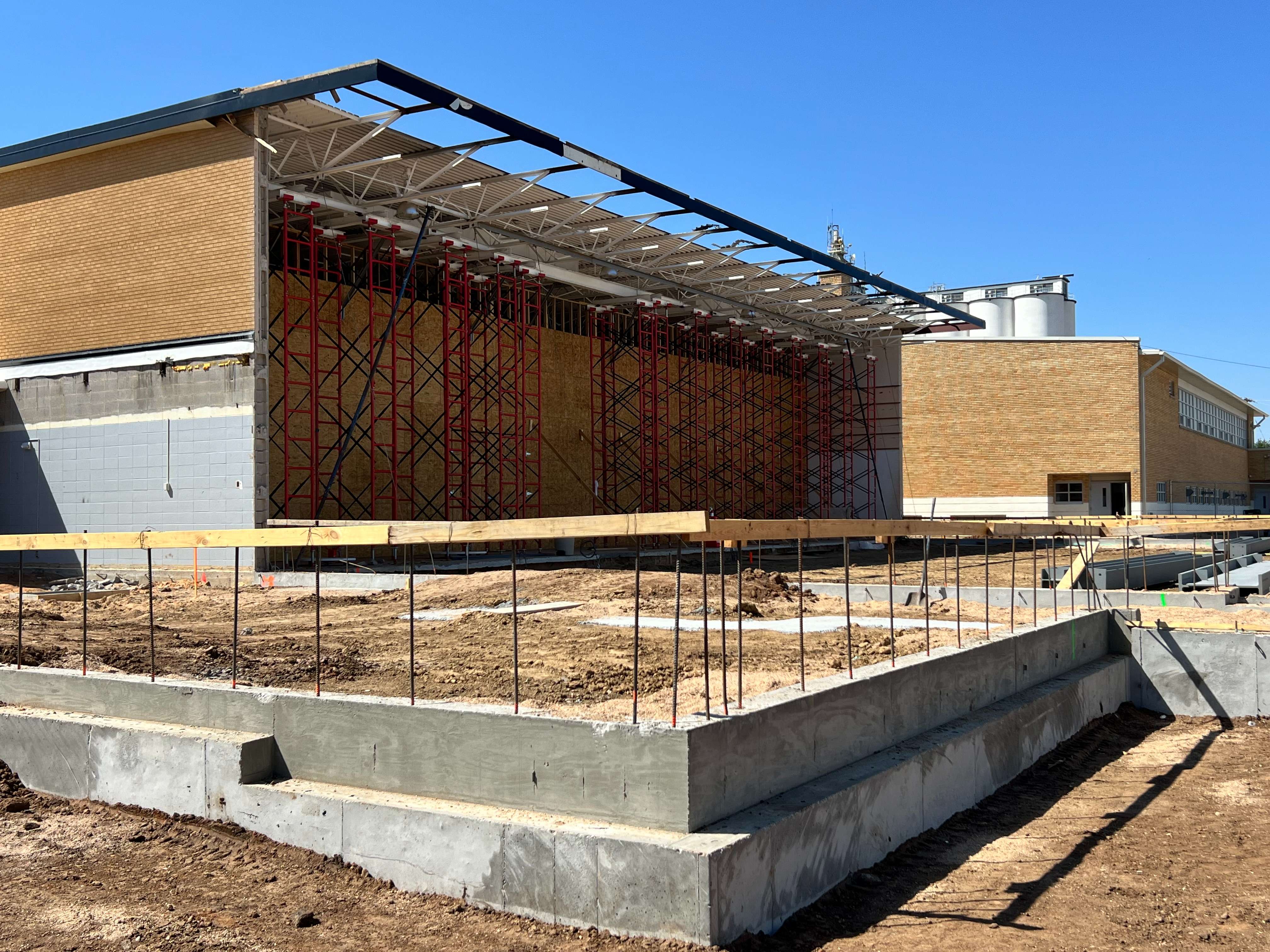 Pretty Prairie USD 311 held a beam signing on Tuesday, Sept. 10, 2024, for its middle school gym expansion. (Sean Boston/Hutch Post Photo)