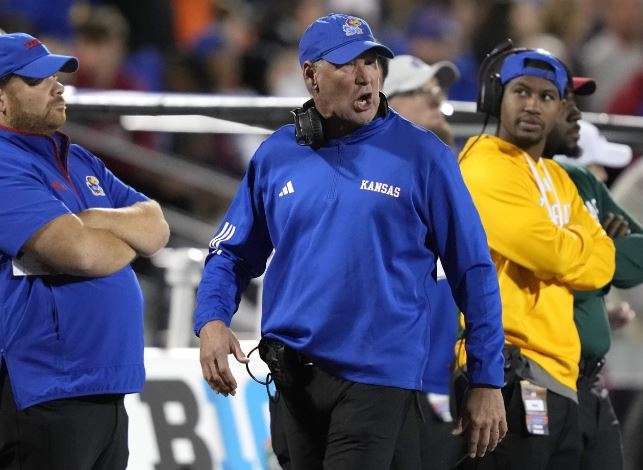 Kansas head coach Lance Leipold yells at an official during the second half of an NCAA college football game against Illinois on Saturday, Sept. 7, 2024, in Champaign, Ill. (AP Photo/Charles Rex Arbogast)