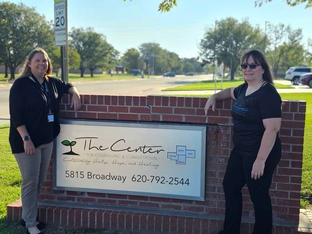 Tracie Haselhorst, left, and Jennifer Johnson, both of The Center for Counseling &amp; Consultation, team up to support people facing mental-health crises. The Mobile Crisis Response program is in its infancy but is already showing promise, they said.