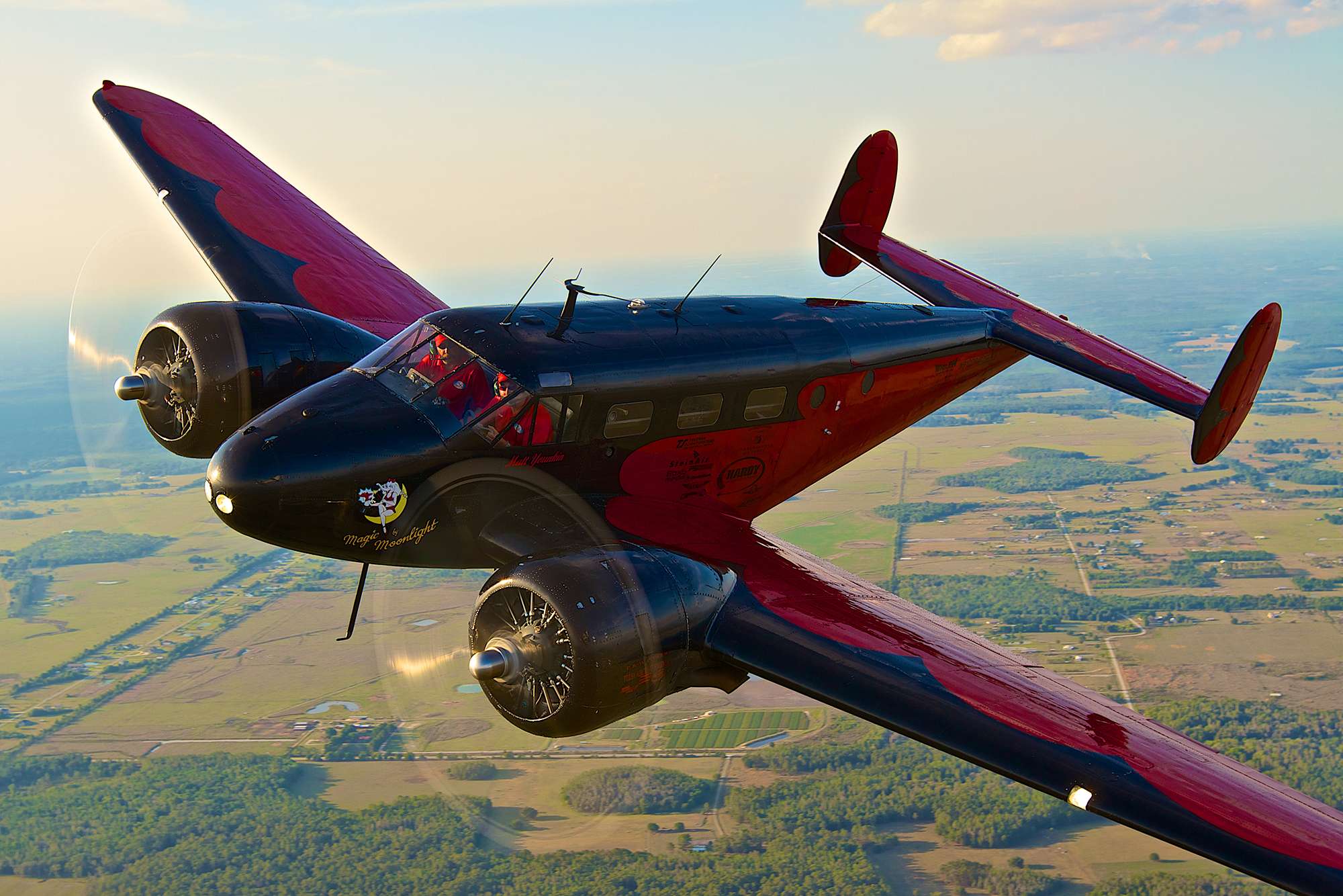 Matt Younkin will fly his Beech 18 in daytime routines and in Saturday's Night Airshow at Great Bend Airfest.