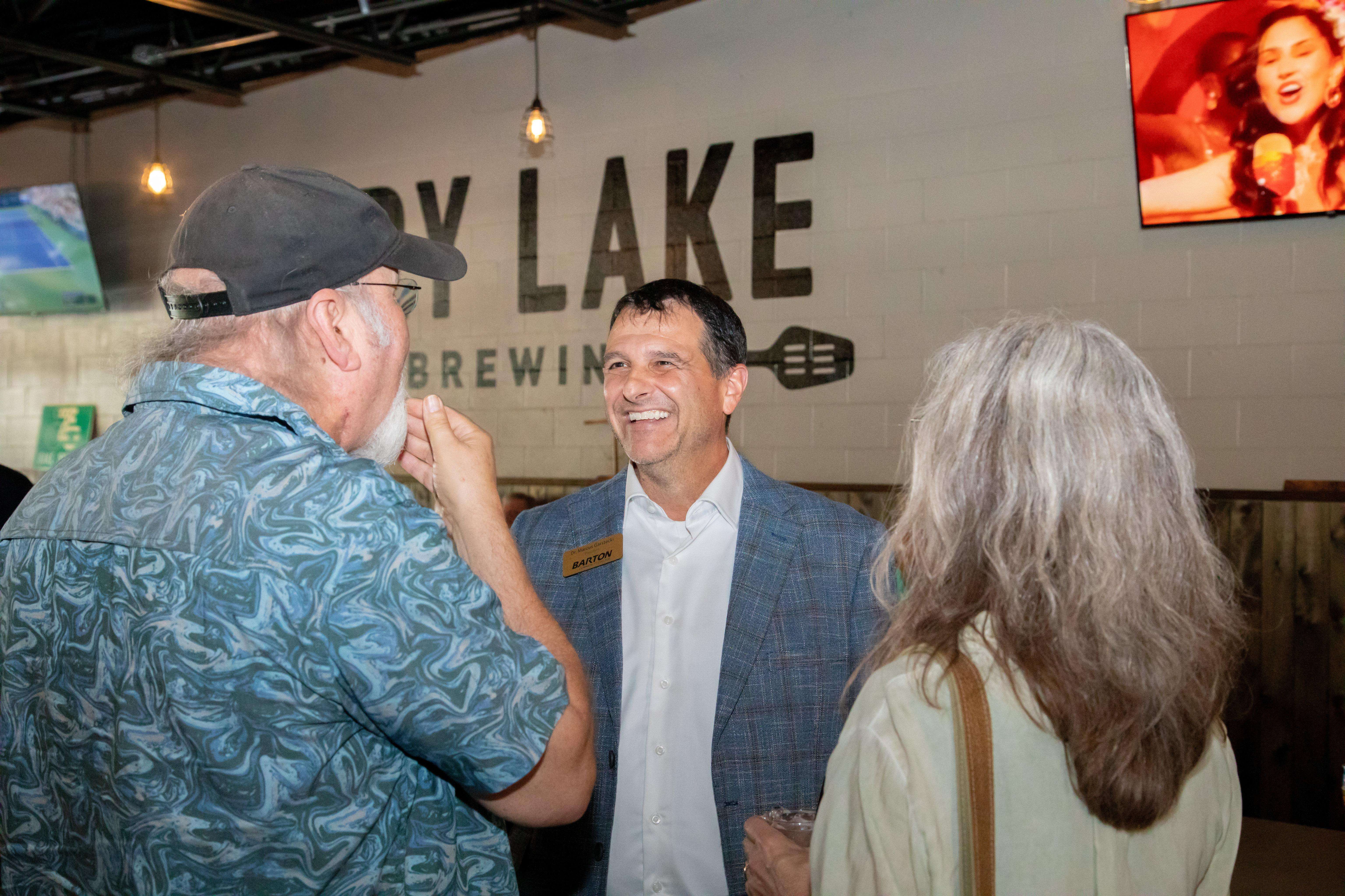 Community members gathered at Dry Lake Brewing in Great Bend for a recent "Meet the President" event, where they had a chance to speak with Barton’s new president, Dr. Marcus Garstecki.