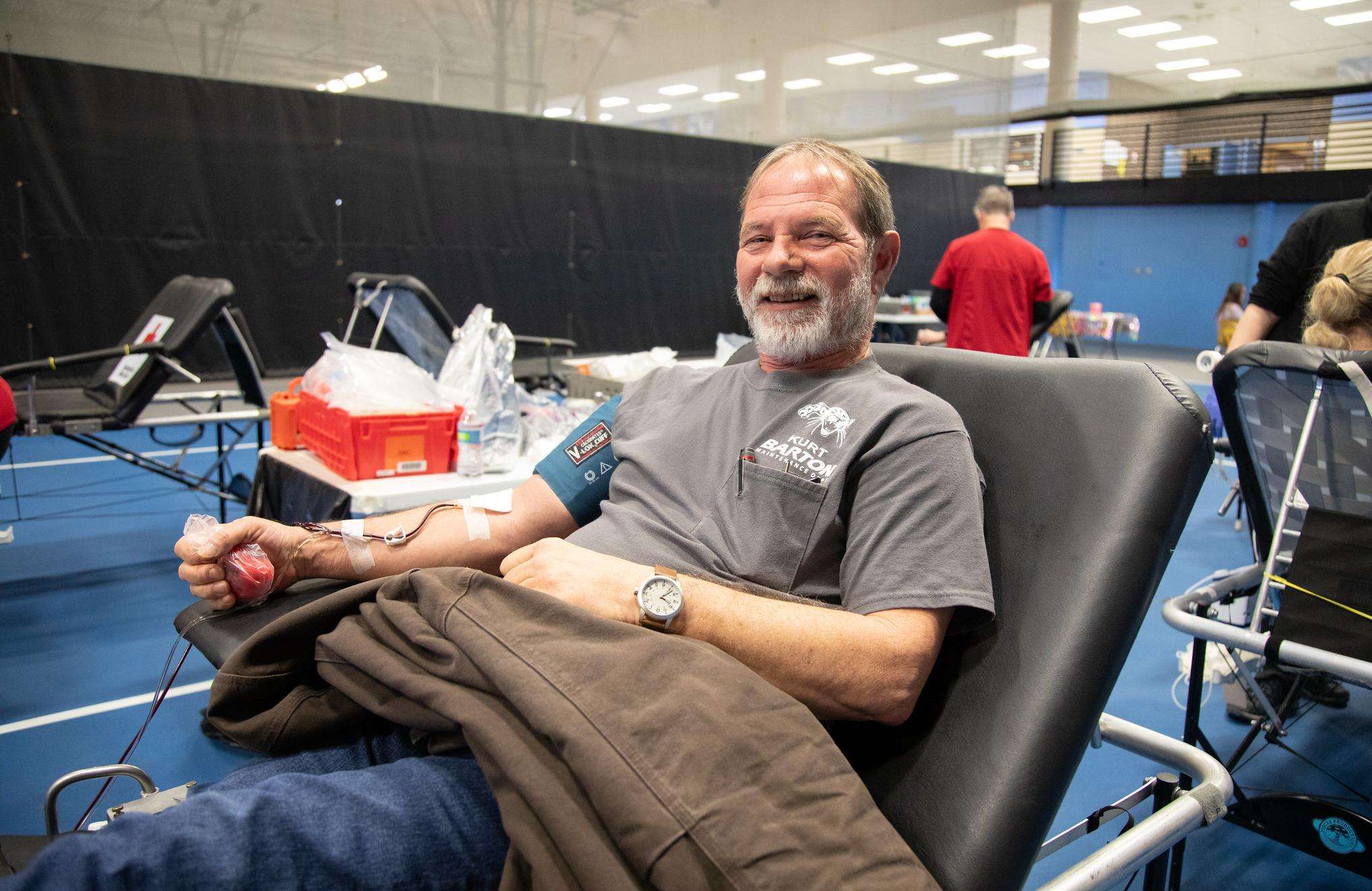 A Barton employee gives blood on the Barton campus at a previous blood drive.
