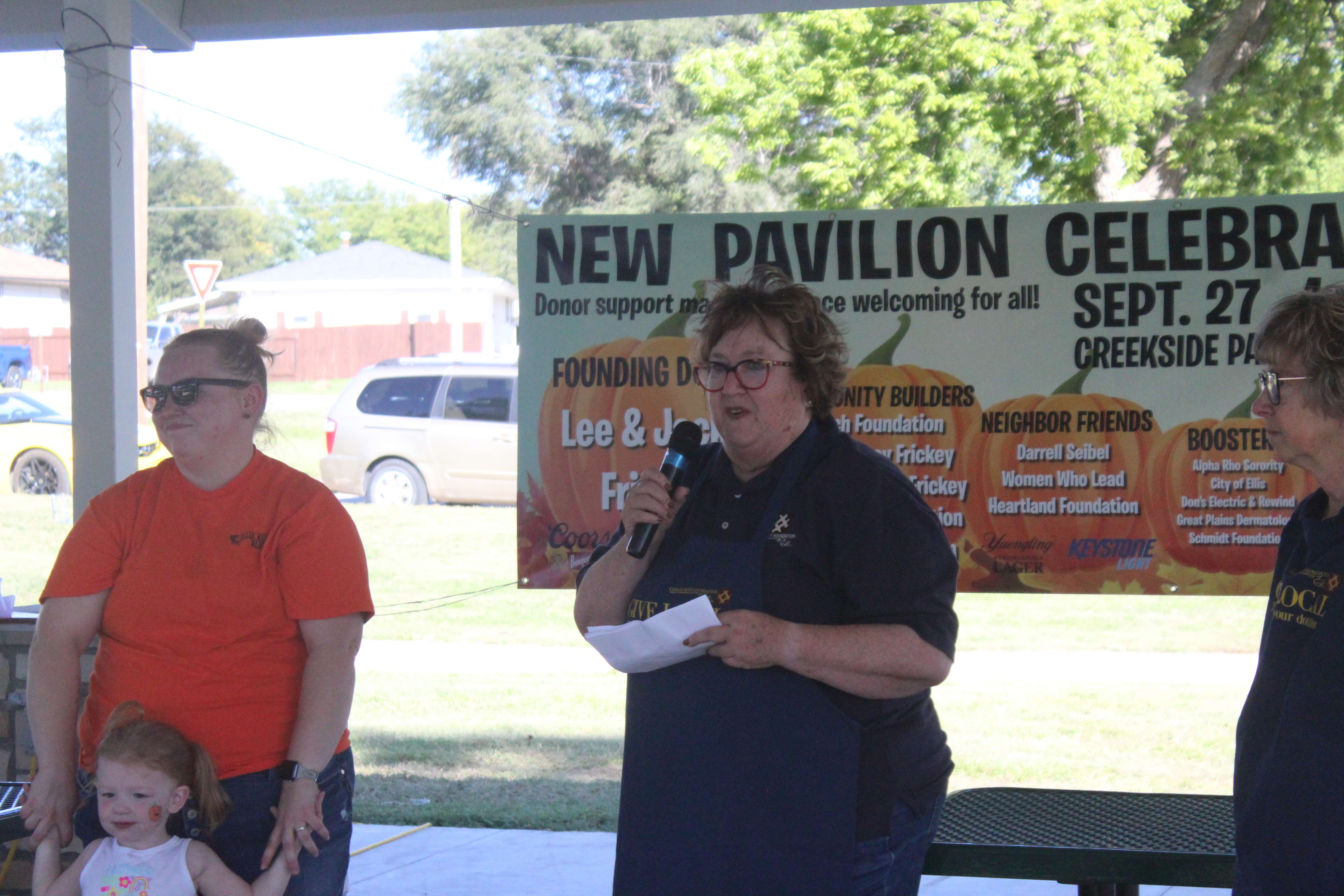 Pauleen Edmonds, Ellis Foundation president, welcomes the community and thanks sponsors on Sept. 28. Photo by Cristina Janney/Hays Post