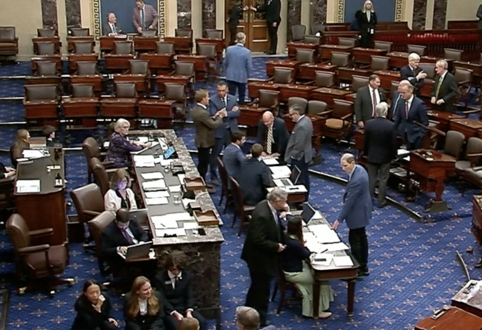 Kansas U.S. Senator Roger Marshall headed for the exit after voting Friday afternoon (top of the image)&nbsp;