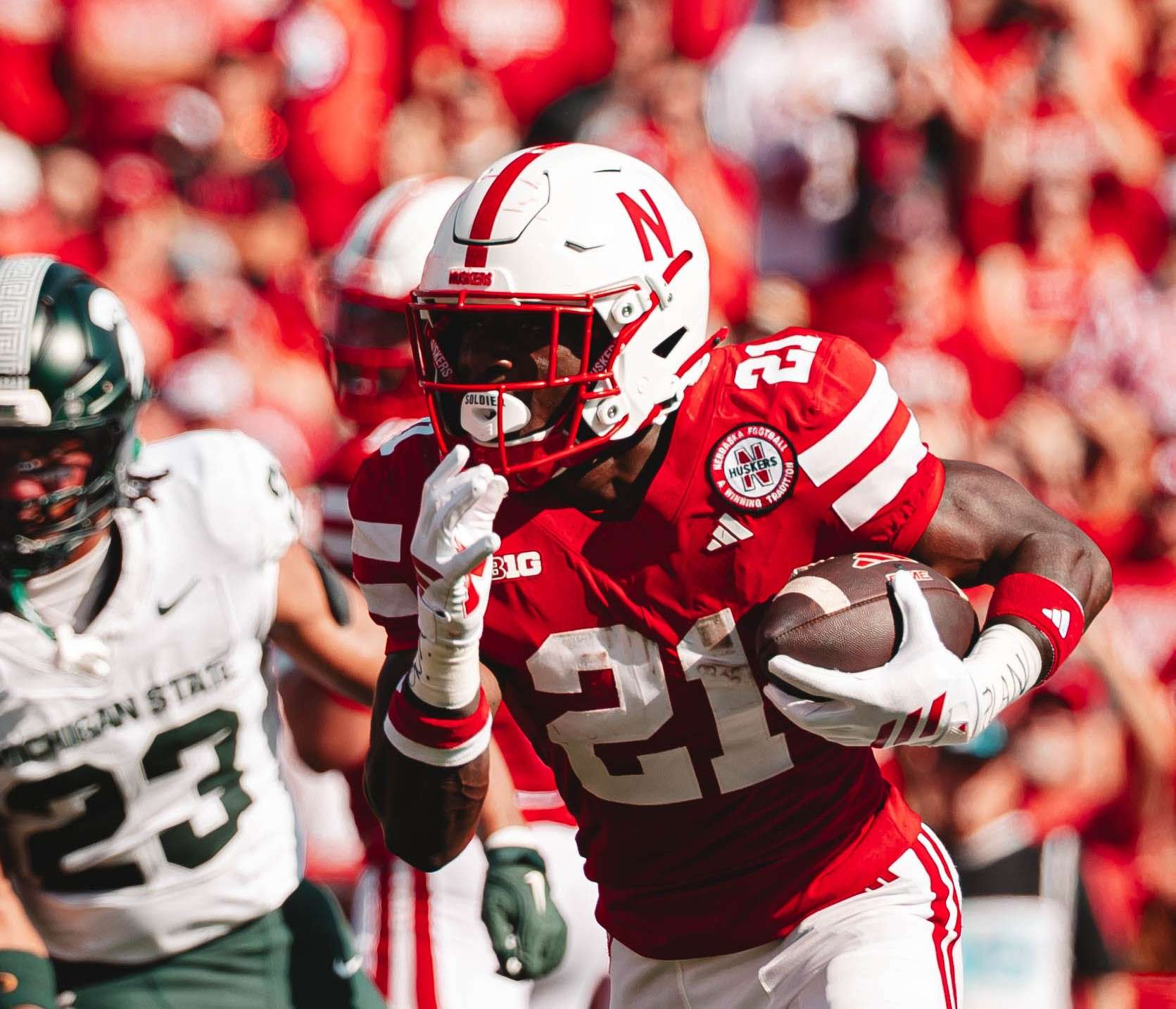 Emmett Johnson rushes four a touchdown in the first half against Michigan State.&nbsp; The Cornhuskers stormed back in the second half to beat the Spartans 38-27 on Saturday/ Photo courtesy of Nebraska Football on X