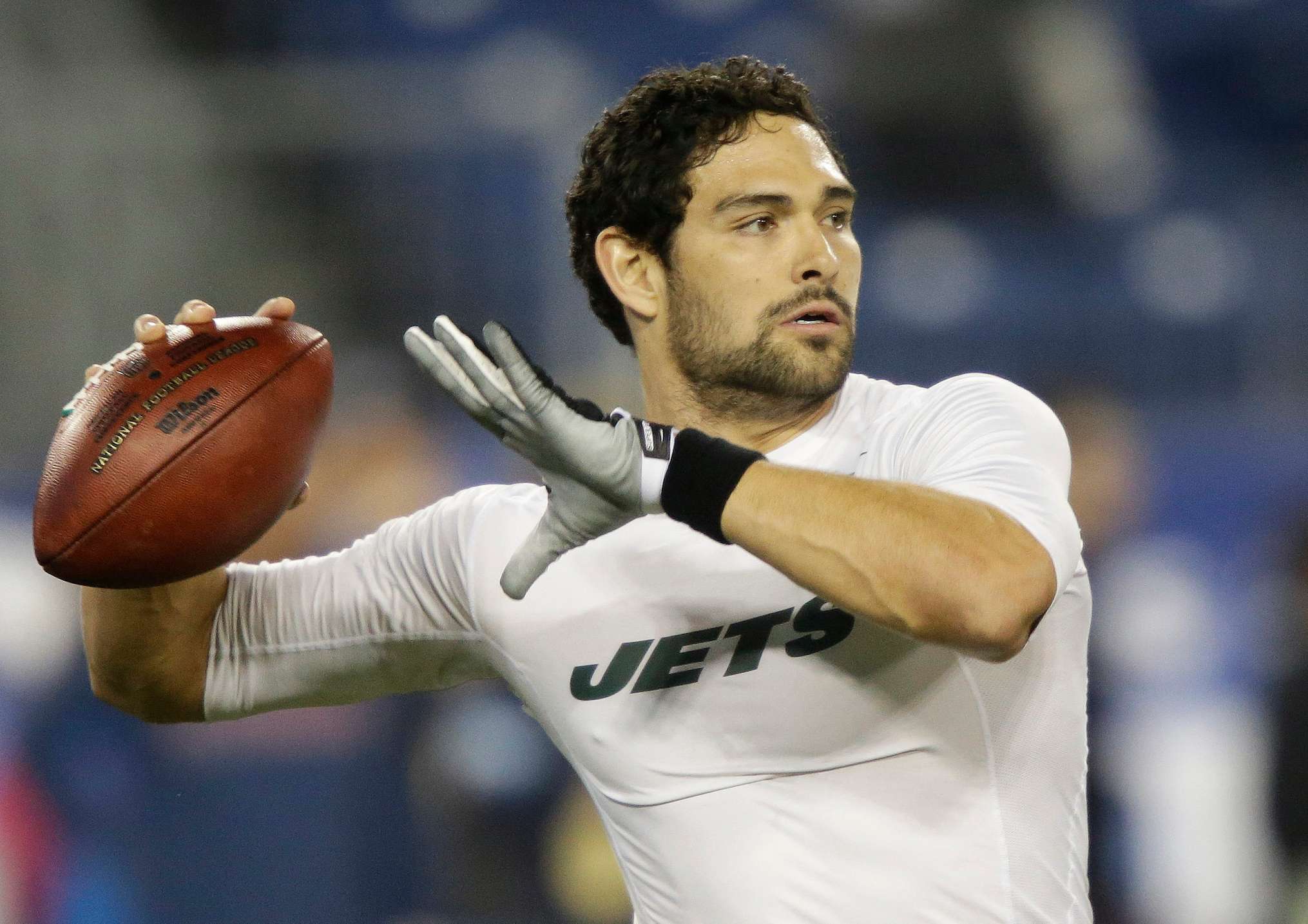 FILE - New York Jets quarterback Mark Sanchez warms up before an NFL football game between the Jets and the Tennessee Titans on Monday, Dec. 17, 2012, in Nashville, Tenn. (AP Photo/Wade Payne, File)