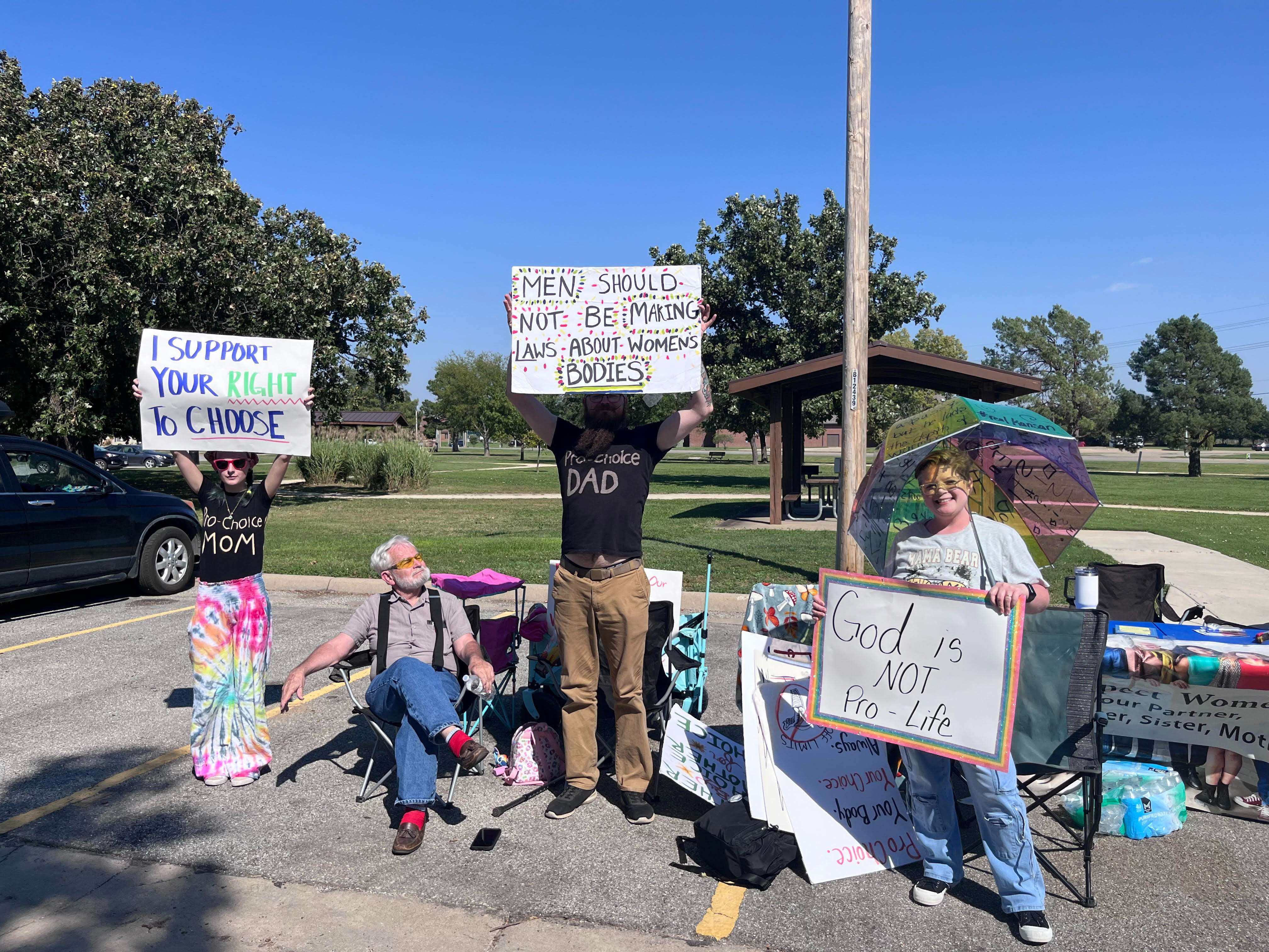 Becky Norlin, CAK Co-Founder (right) and others protesting AFTERMATH event at Jerry Ivey Memorial Park on Friday, October 3. Photo by Nicolas Fierro