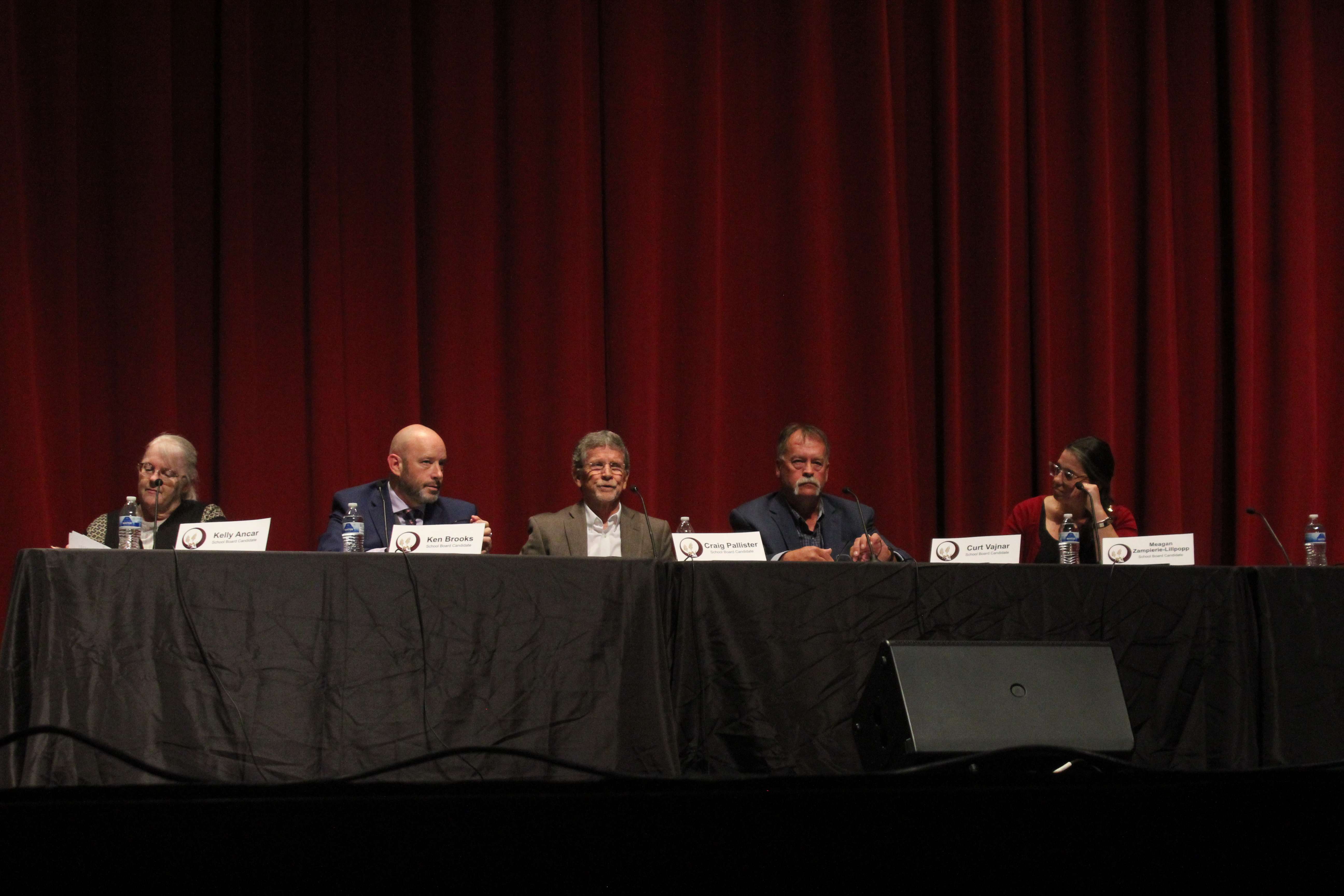 Hays USD 489 candidates Kelly Ancar, Ken Brooks, Craig Pallister, Curt Vajnar and Meagan Zampieri-Lillpopp Monday night at the Beach Schmidt Performing Arts Center for a candidate forum. Photo by Cristina Janney/Hays Post