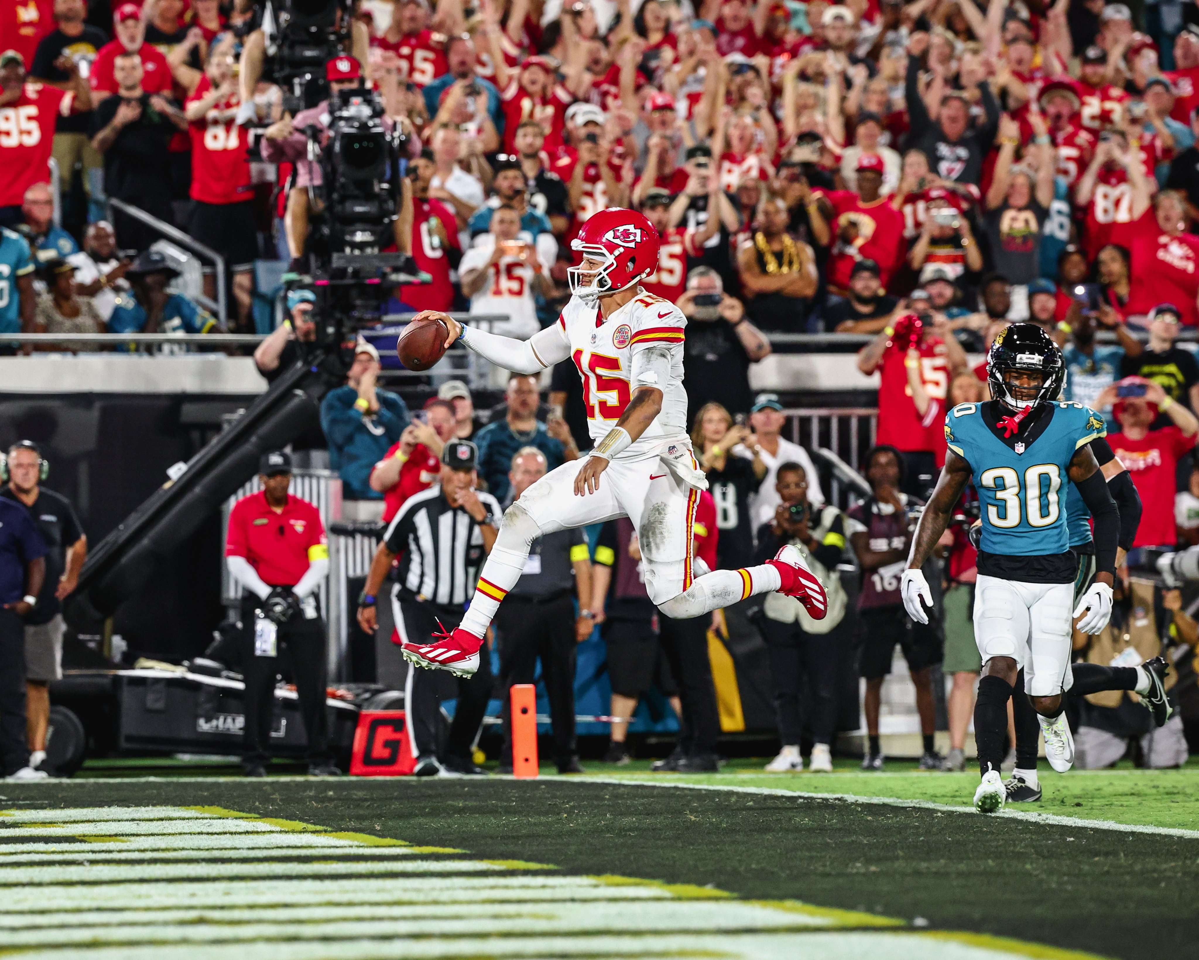 Patrick Mahomes leaps across the goal line on his nine yard rushing score/ Photo courtesy of the Kansas City Chiefs on X