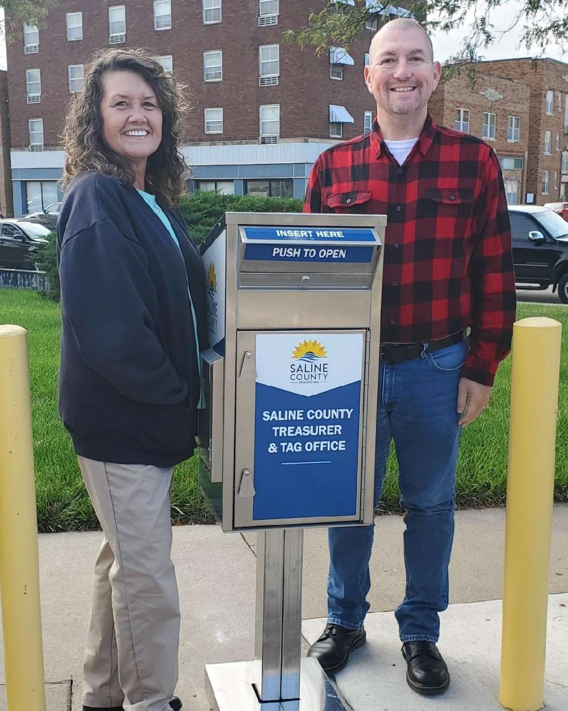 Saline County Treasurer's Office installs new payment dropbox for tax payments, tag renewals and public convenience.