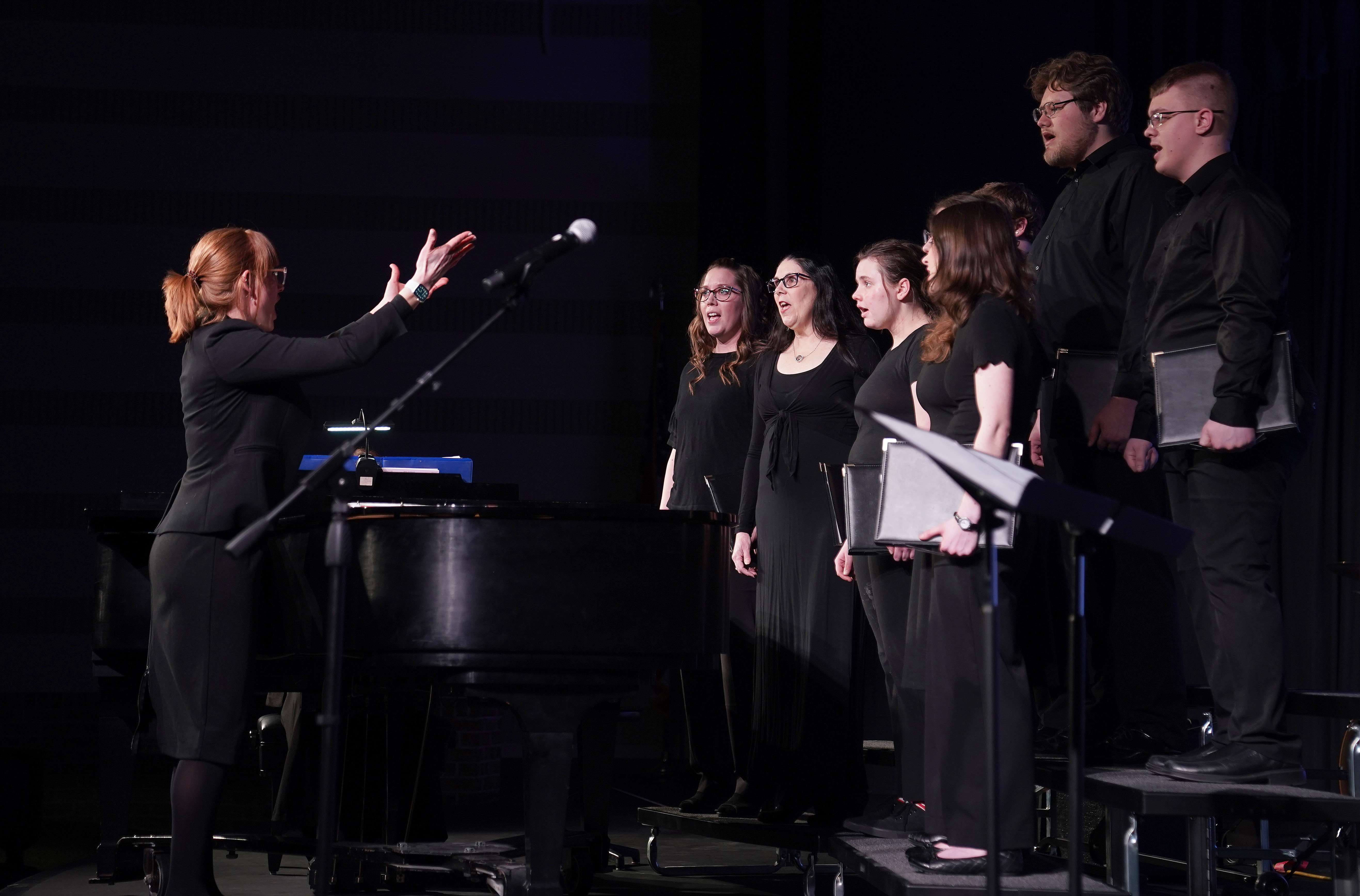 MPCC Lead Music Instructor Kristin Simson directs the NPCC Knightly Singers during the spring concert on March 4, 2025. (Courtesy MPCC)