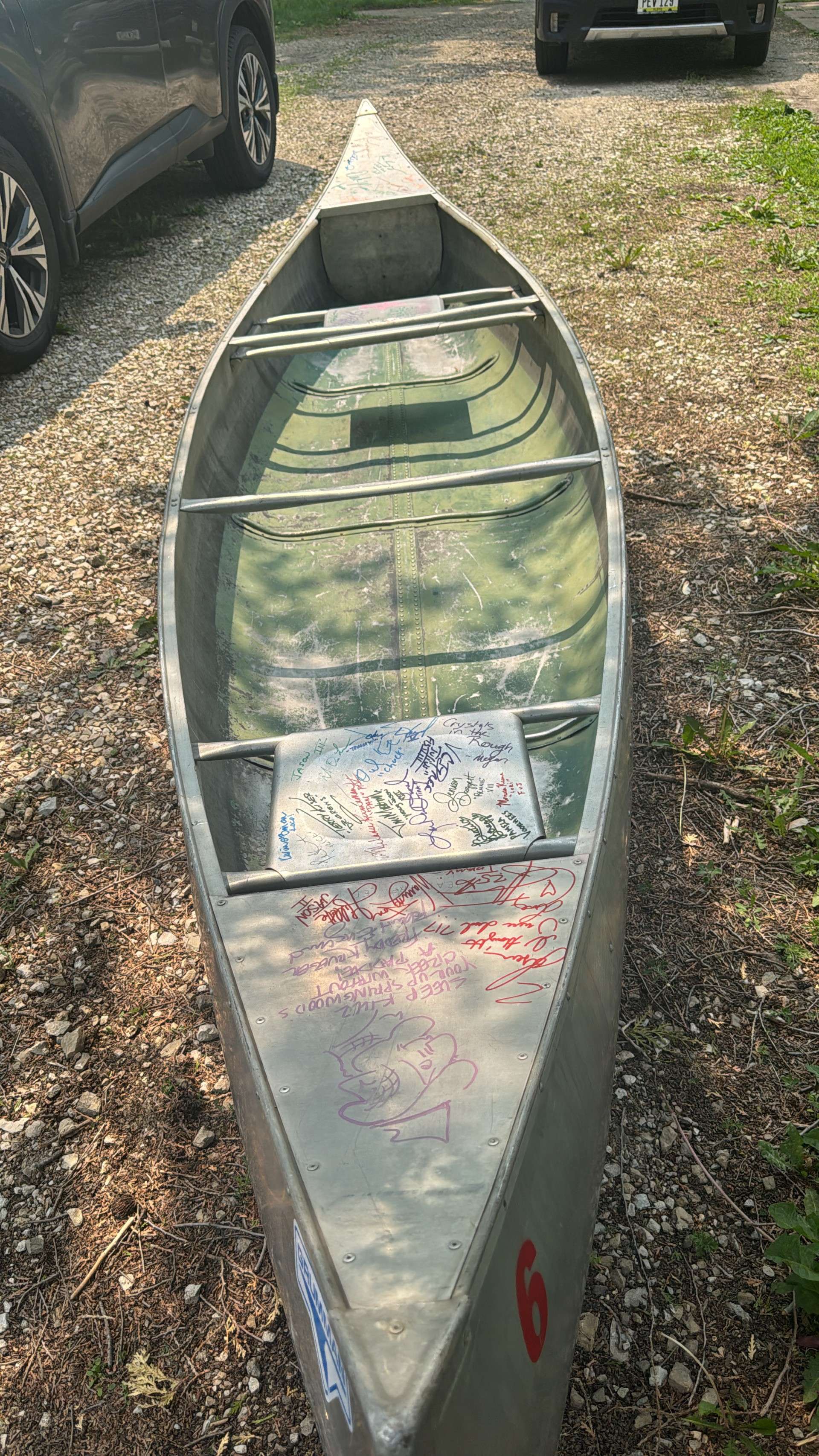 First film of "Friday the 13th" original canoe with signatures of people apart of the movie franchise. Courtesy of John Miller