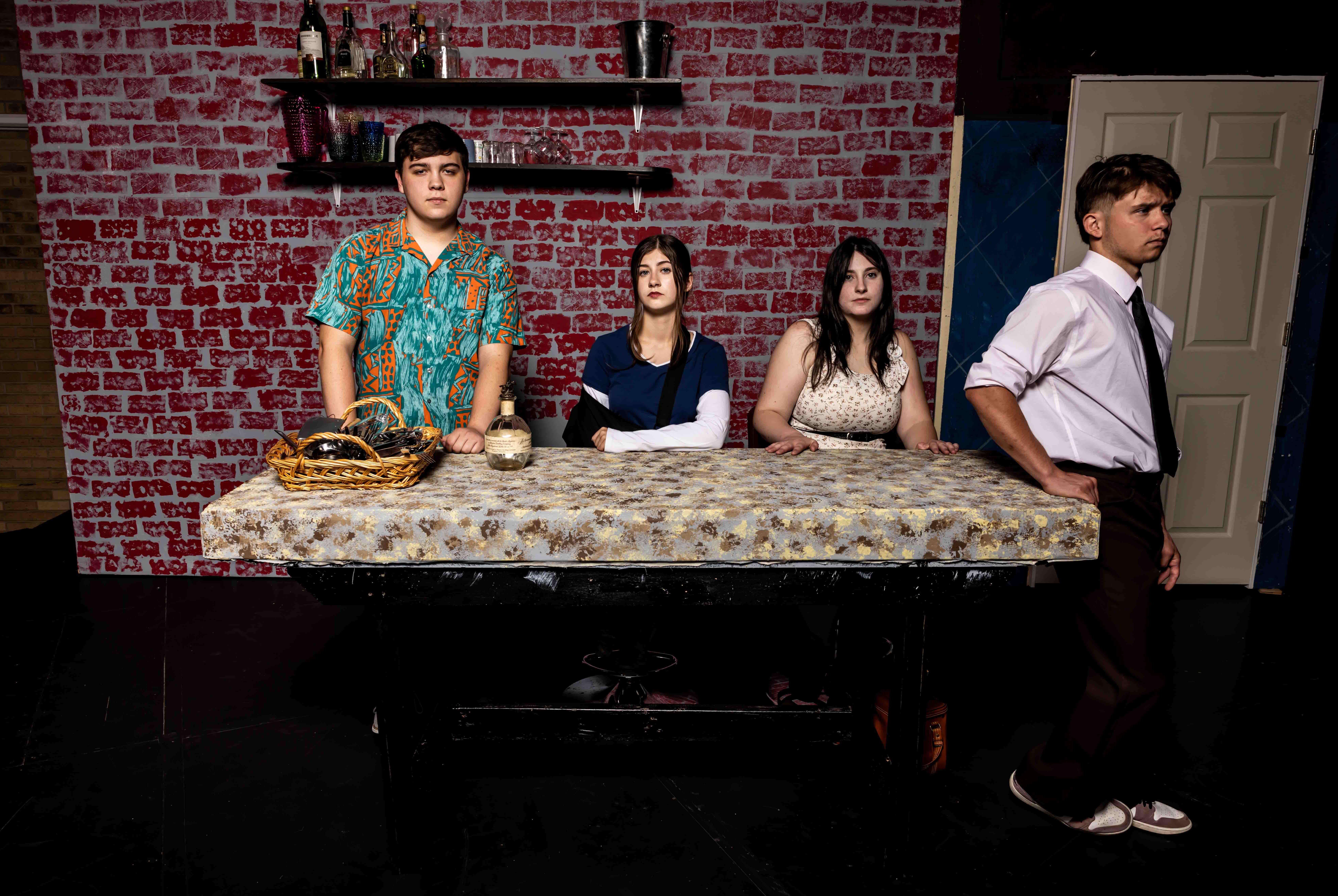 The cast of Barton Theatre’s Fall Play “Time Stands Still” (From left) Justin Villalpando, Anna Bitter, Elydia Harr, and Joshua Almanza, pause for a photo during rehearsal in the Fine Arts Auditorium on Wednesday evening.