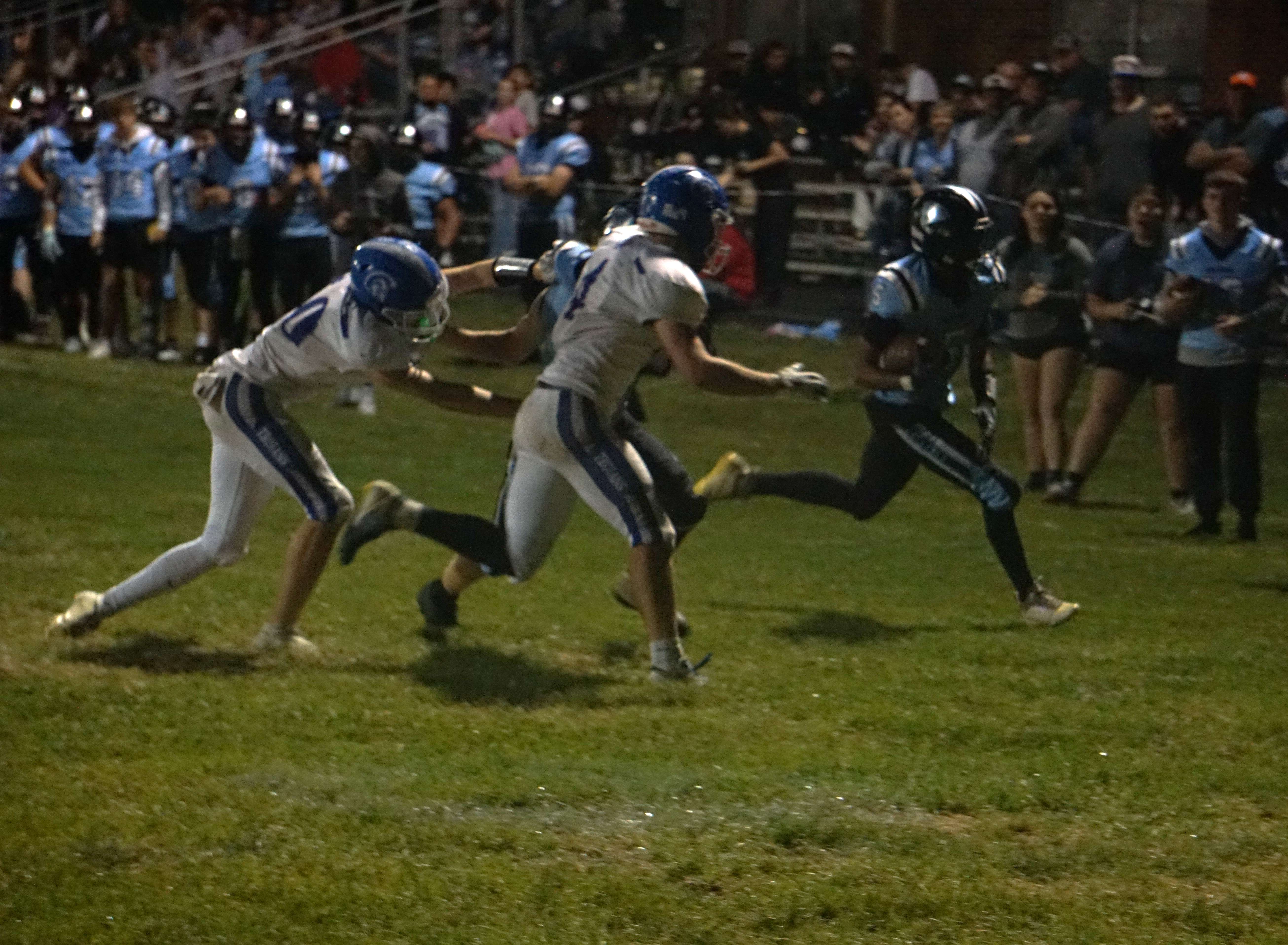 Riverside's Ty'zell Harrington (5) goes around the edge for a touchdown/ Photo by Matt Pike