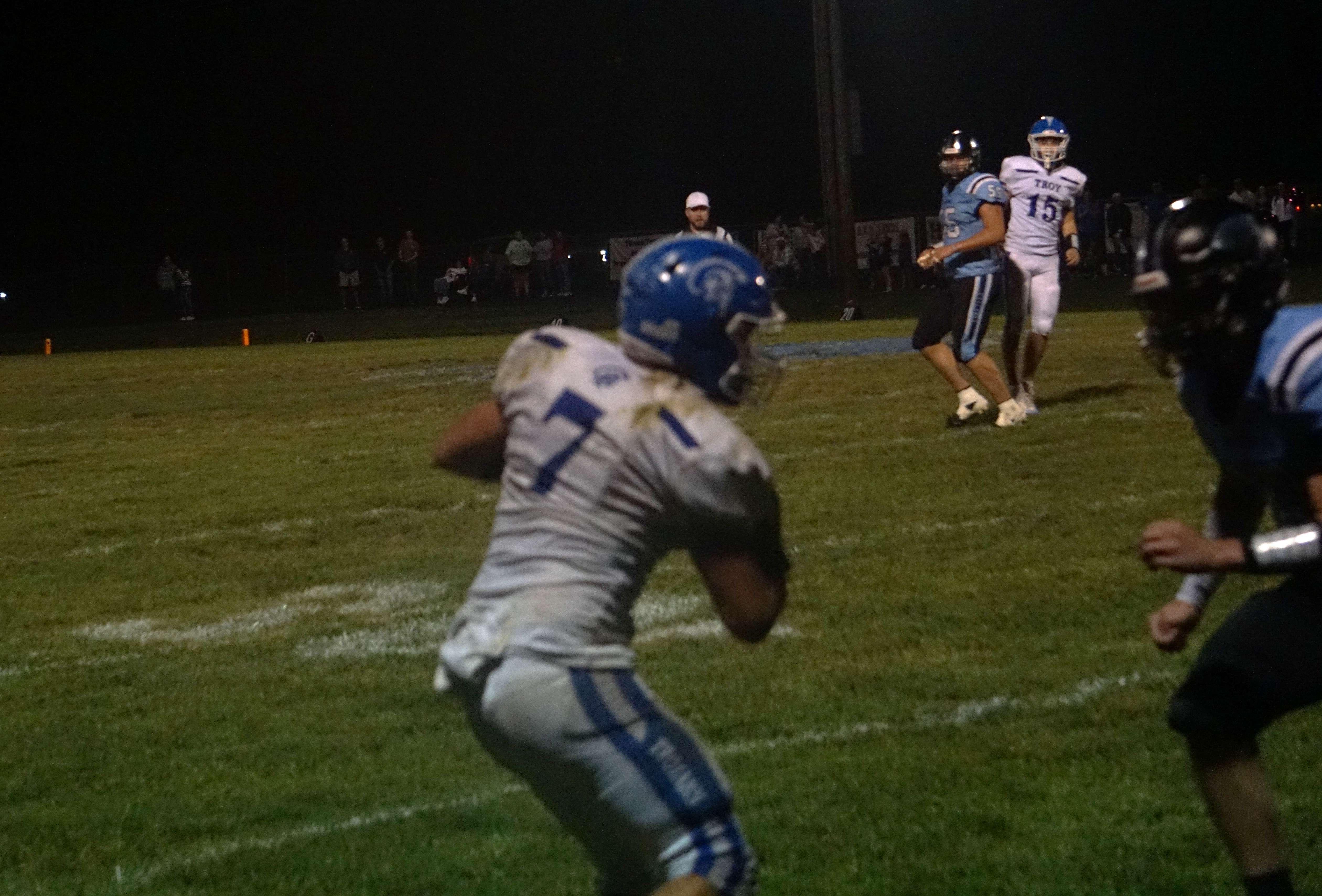 Troy's Caden Rosenberger makes a catch along the sideline&nbsp;