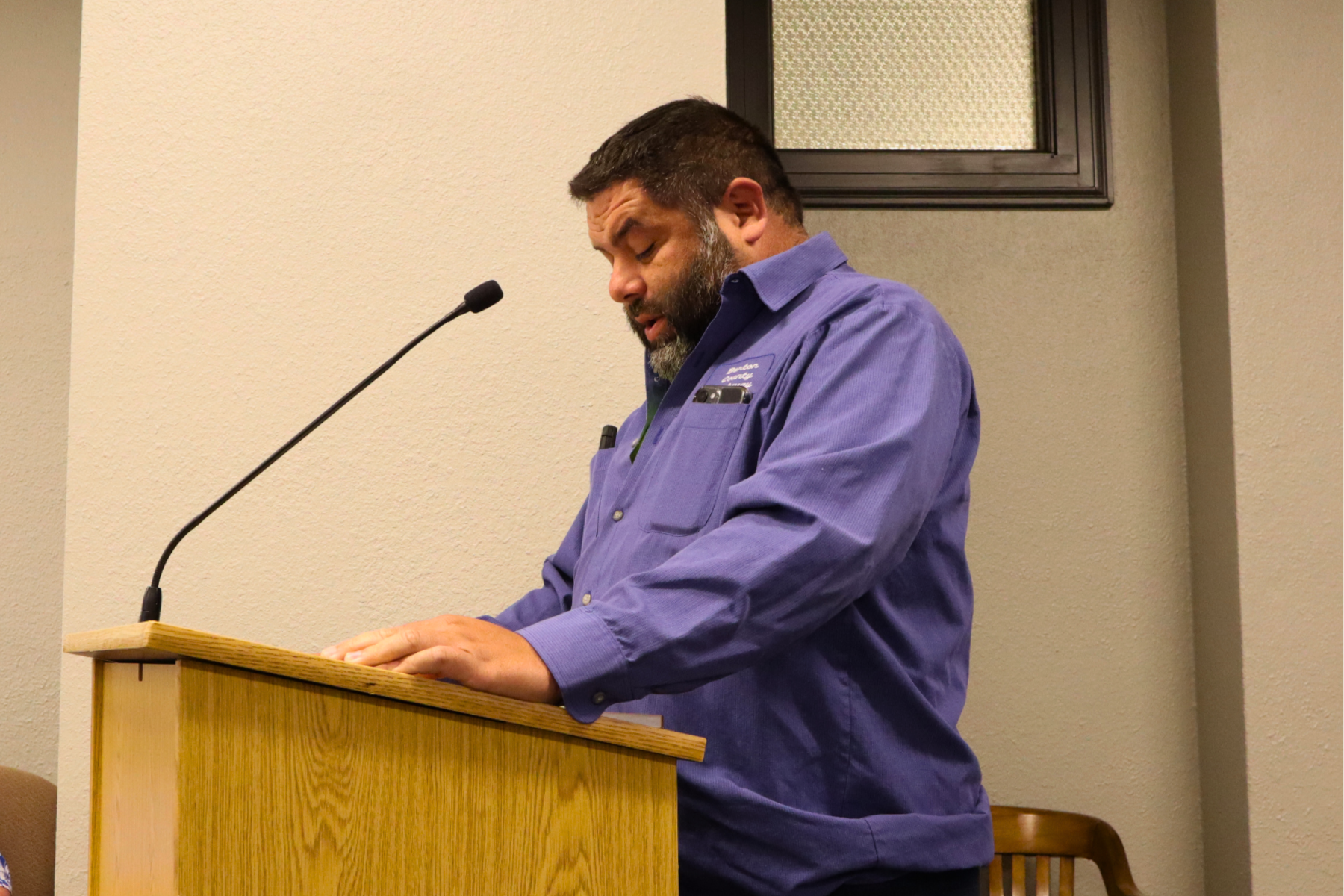 Chris Schartz, county works director, presents a renewed lease agreement to the County Commission for a site his department uses to store materials and equipment.
