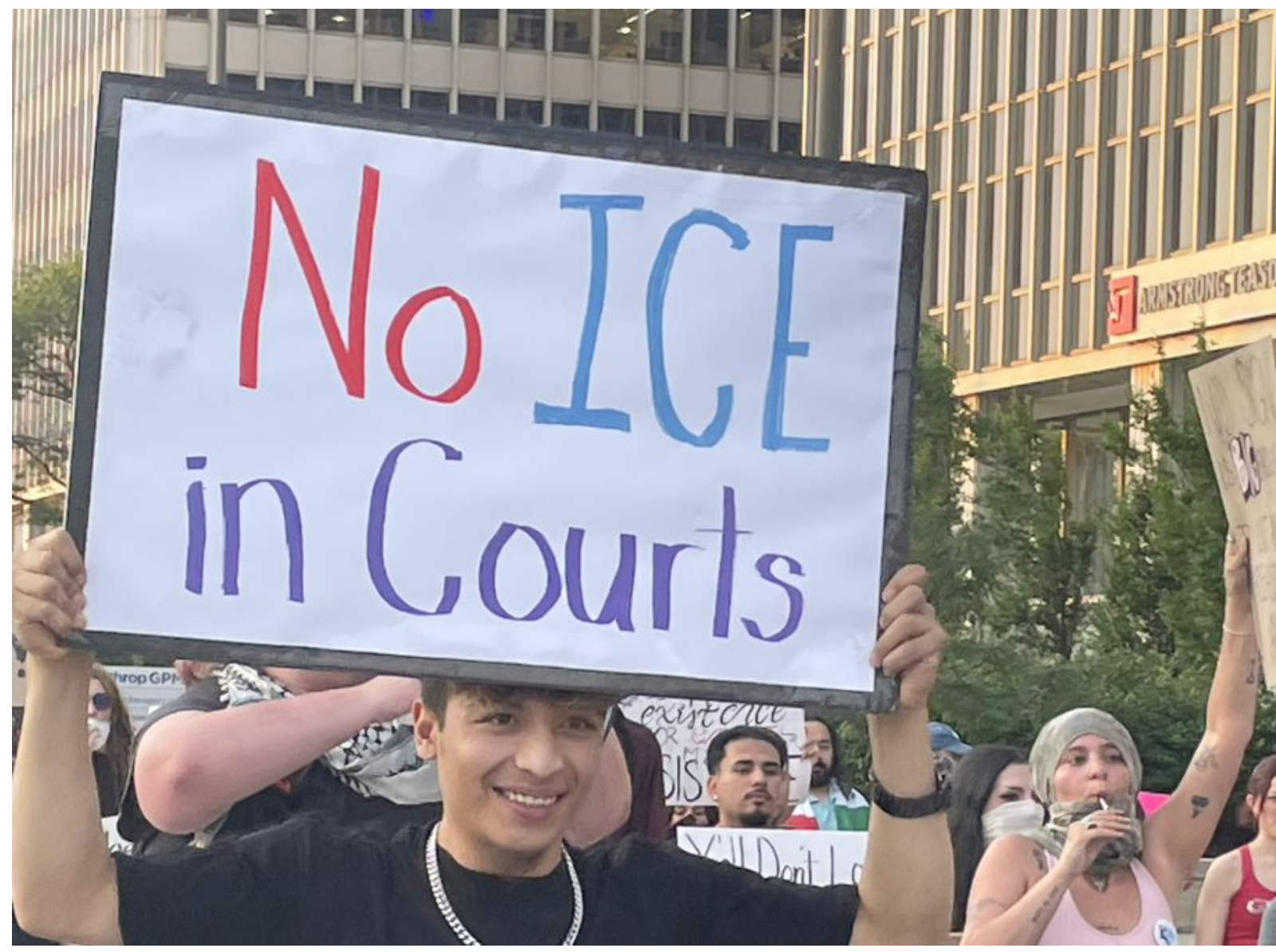 Protesters outside of Kansas City’s immigration court (Mary Sanchez/The Beacon).