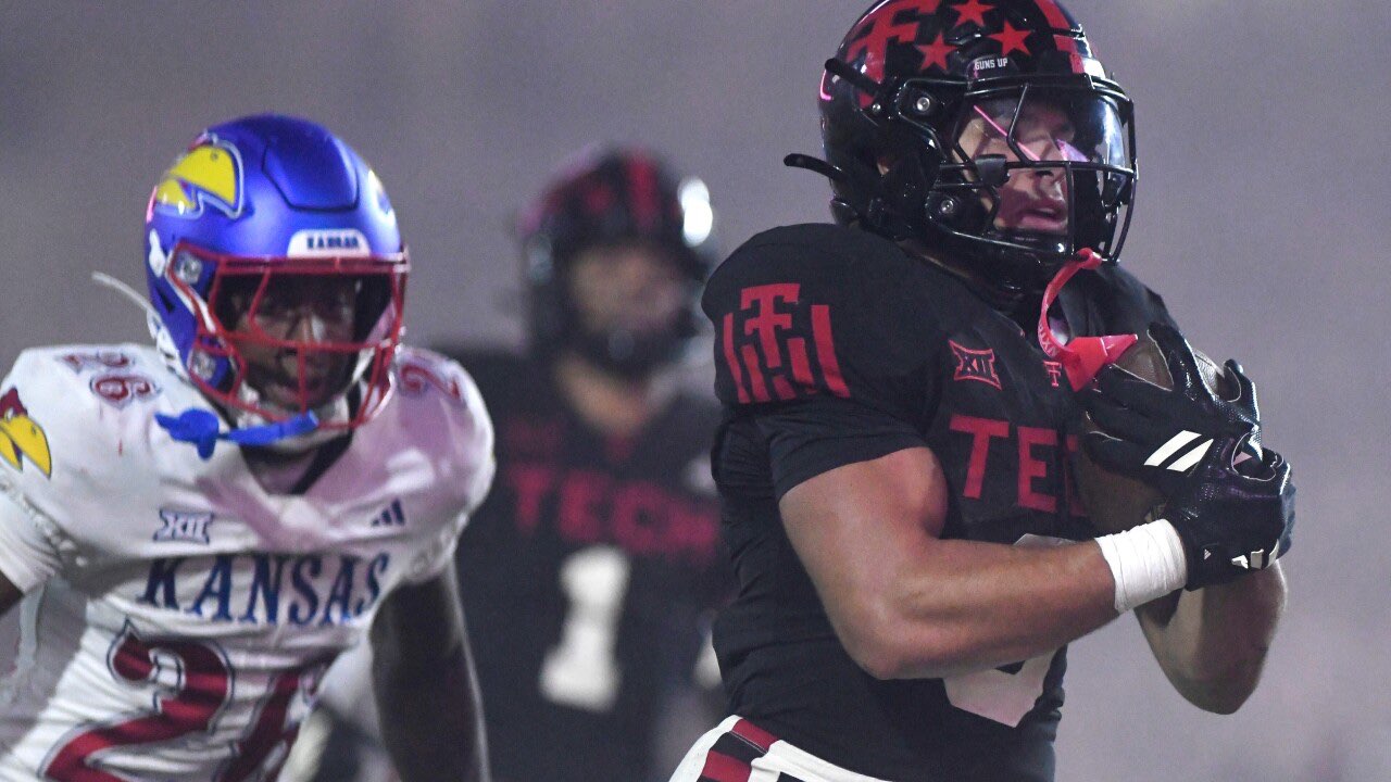 Texas Tech running back Cameron Dickey (8) runs into the end zone for a touchdown during the fourth quarter of an NCAA college football game, Saturday, Oct. 11, 2025, in Lubbock, Texas. (AP Photo/Annie Rice)
