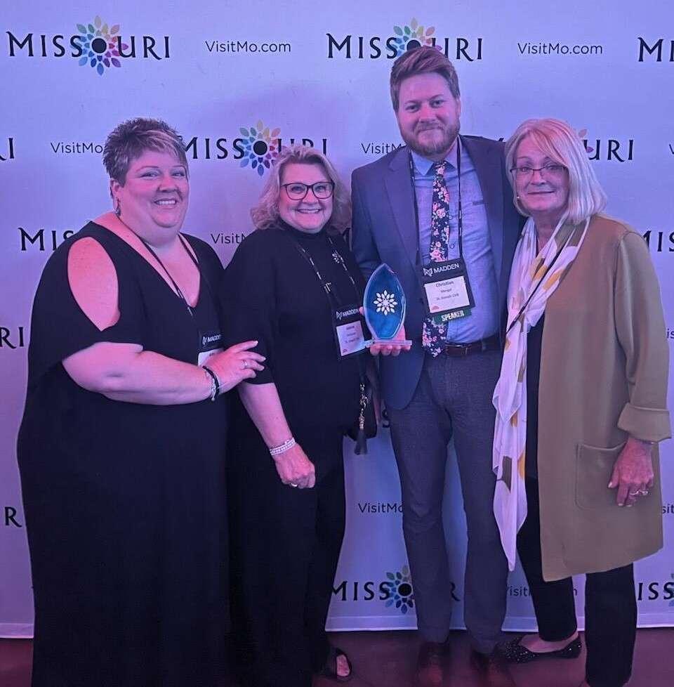 Christian Mengel and the team from the St. Joseph Convention and Visitors Bureau pose after Mengel was awarded with the Film Industry Champion award from the Missouri Division of Tourisim/ Photo courtesy of Christian Mengel